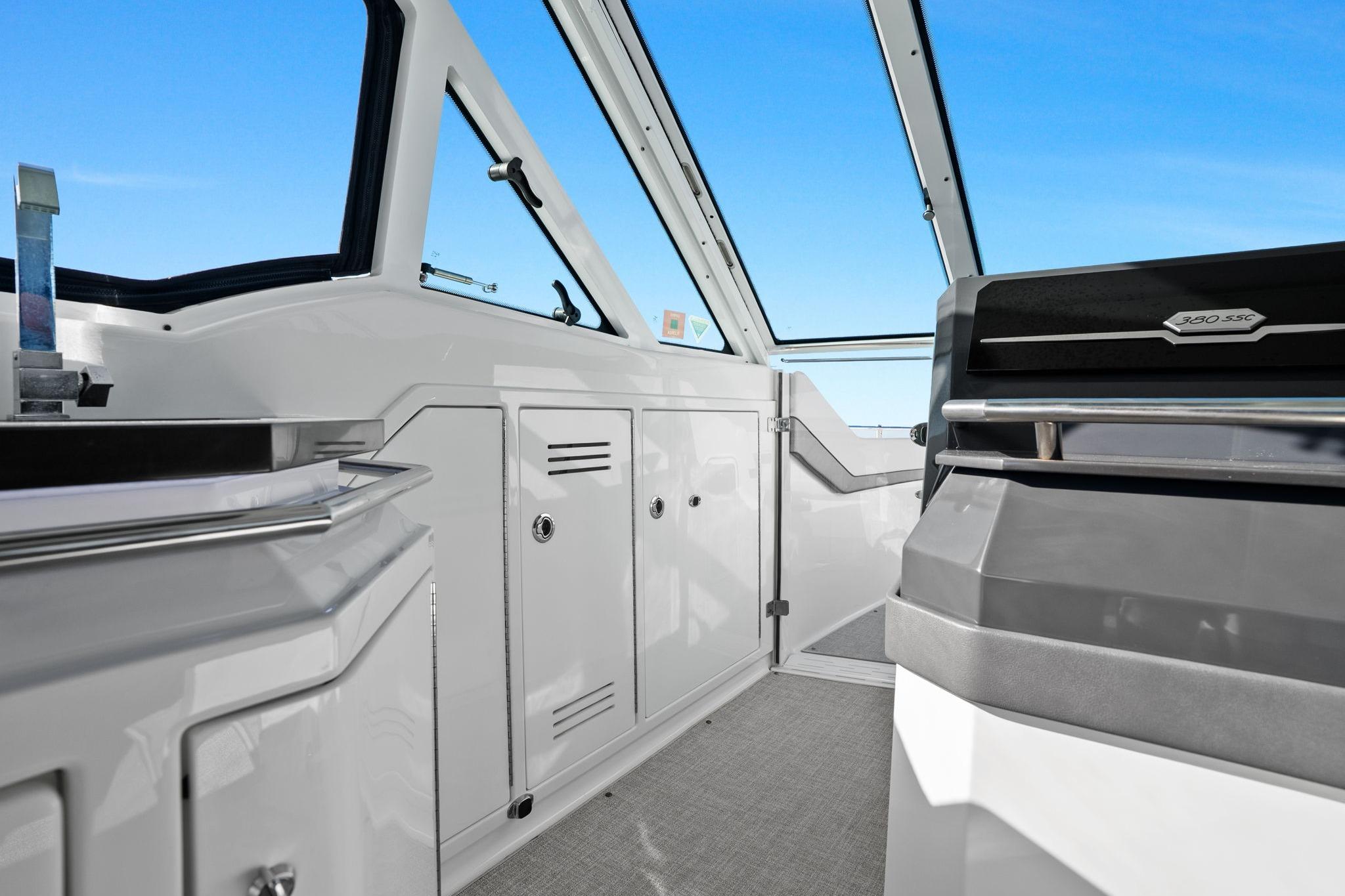 Interior view of 2023 Formula 380 Super Sport Crossover OB boat cockpit.