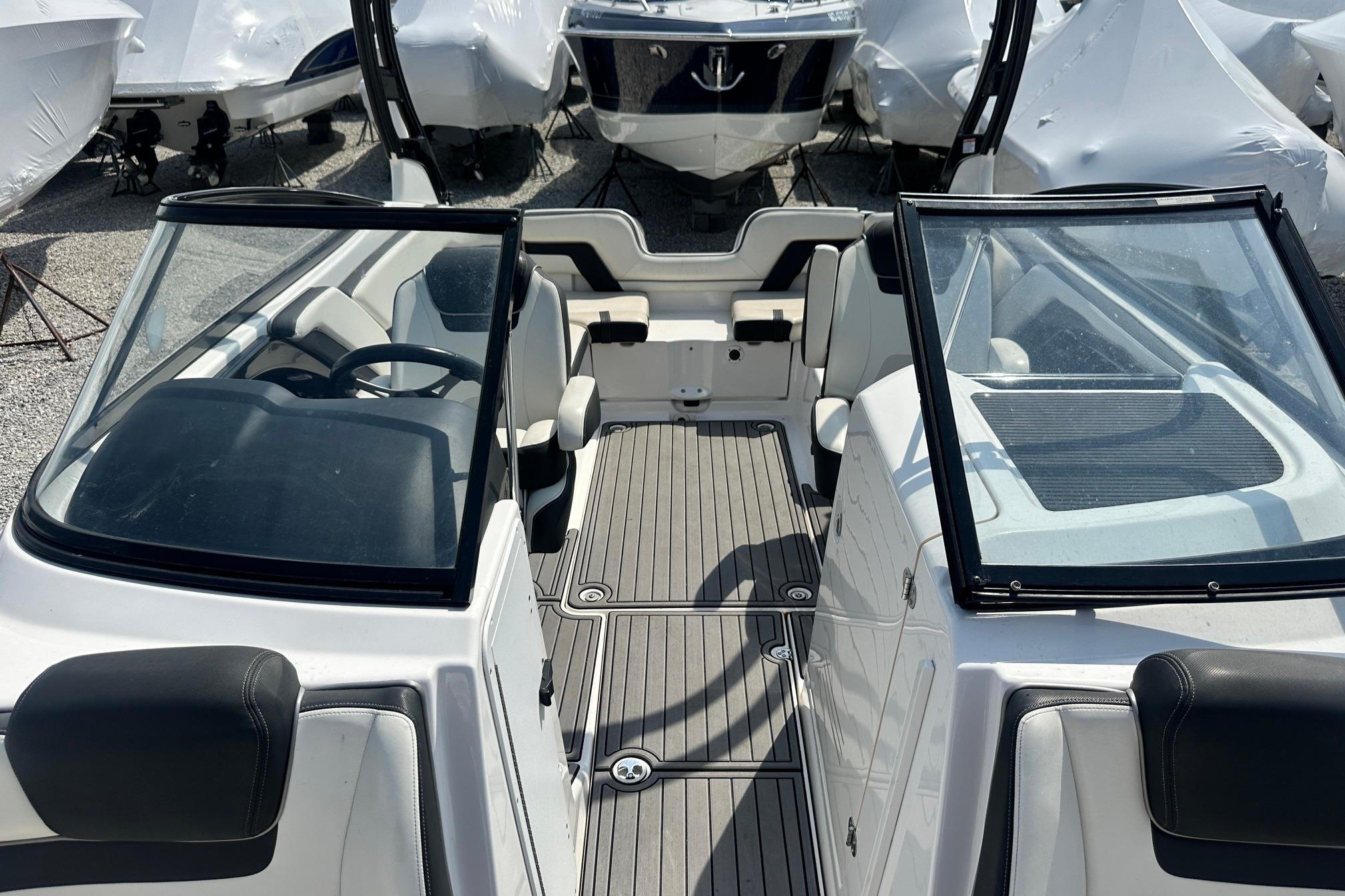 2016 Yamaha 242 Limited S boat interior with open cockpit and seating.