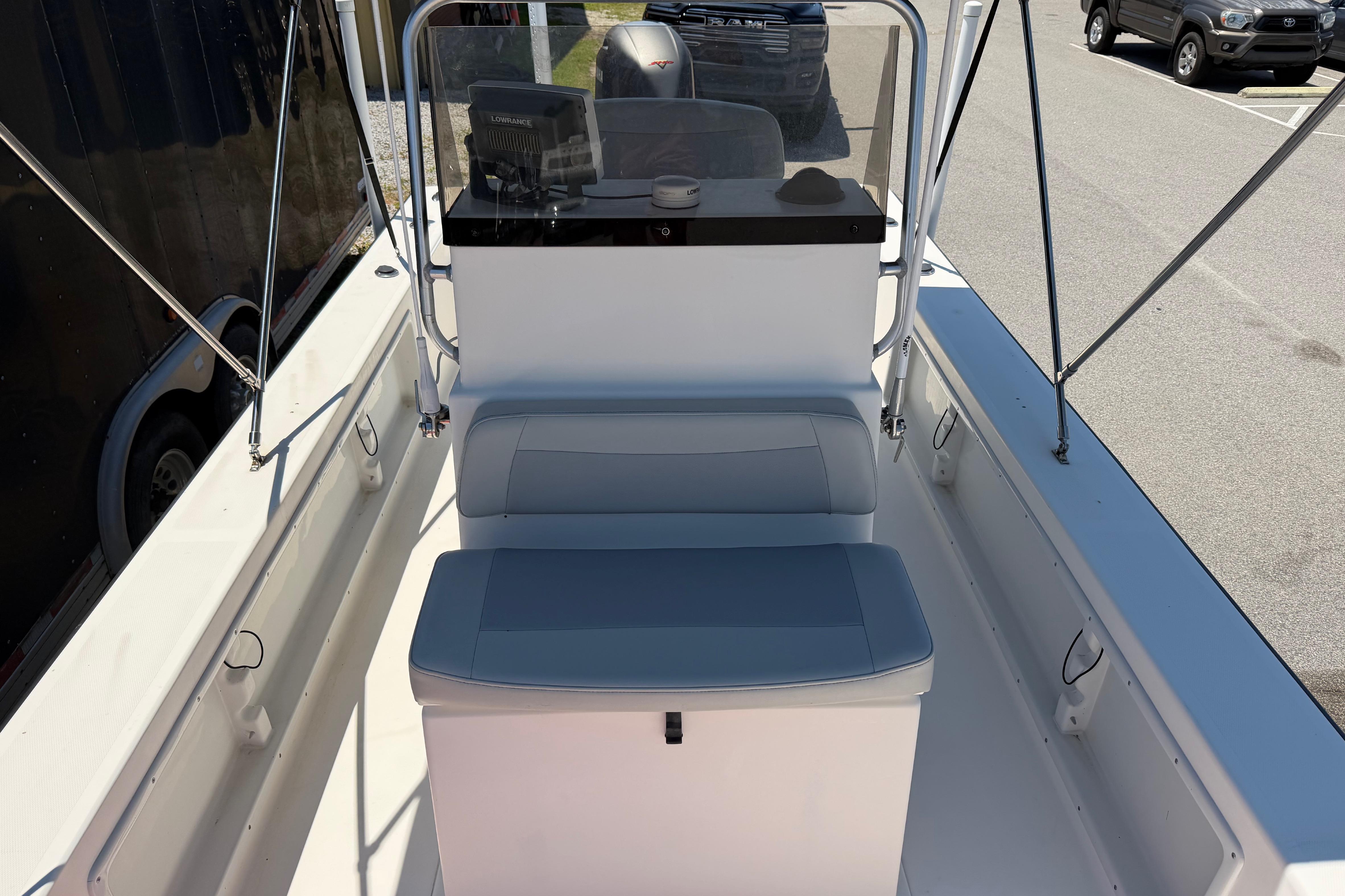 2008 KenCraft Bay Rider 2060 boat interior with seating and console, parked on pavement.