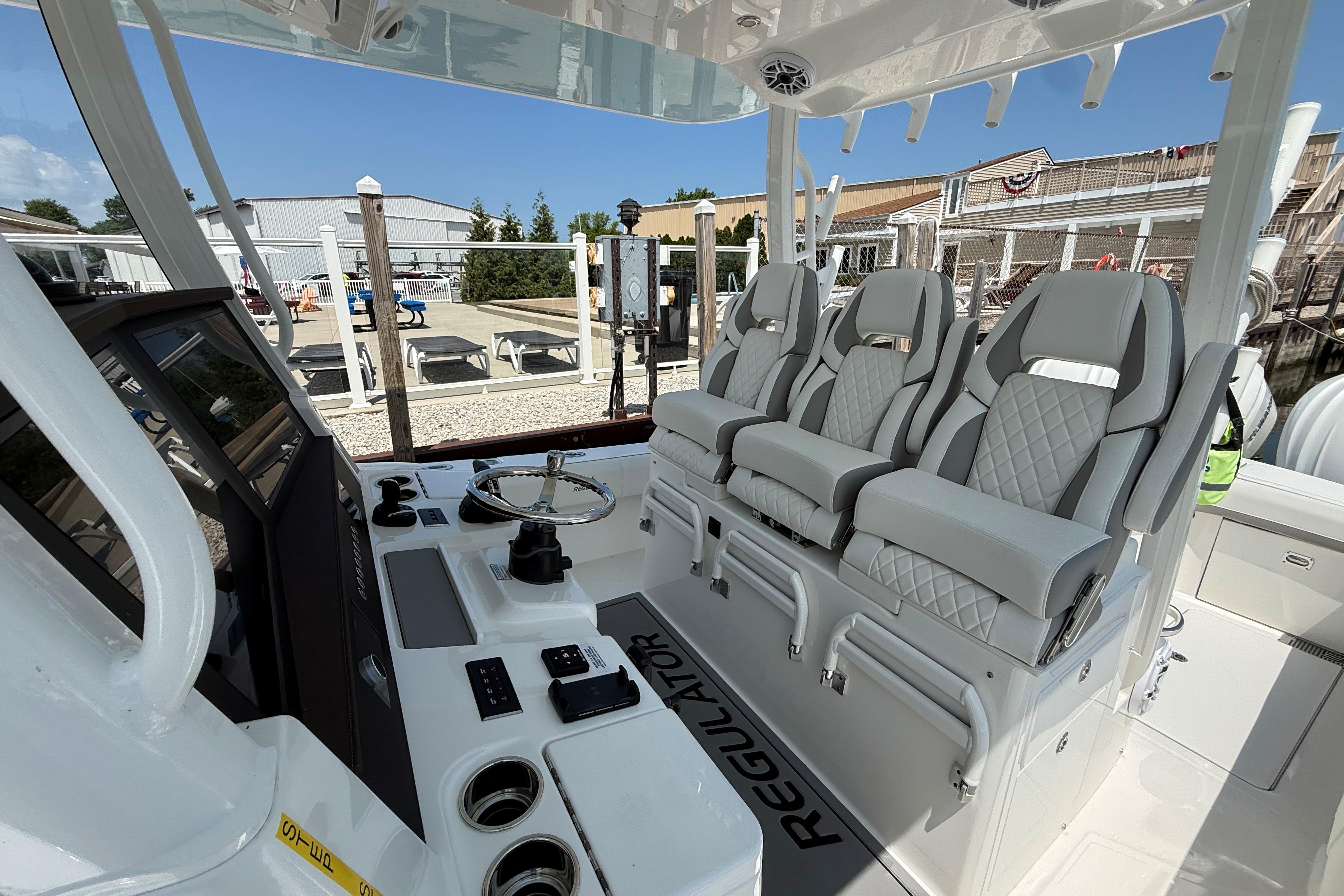 Interior view of 2026 Regulator 35 boat with luxurious seating and modern controls.