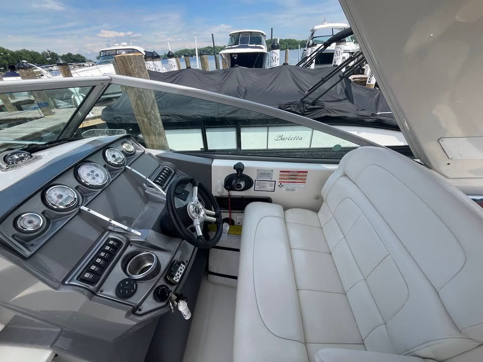 Interior of a 2011 Monterey 280SCR boat at the dock.
