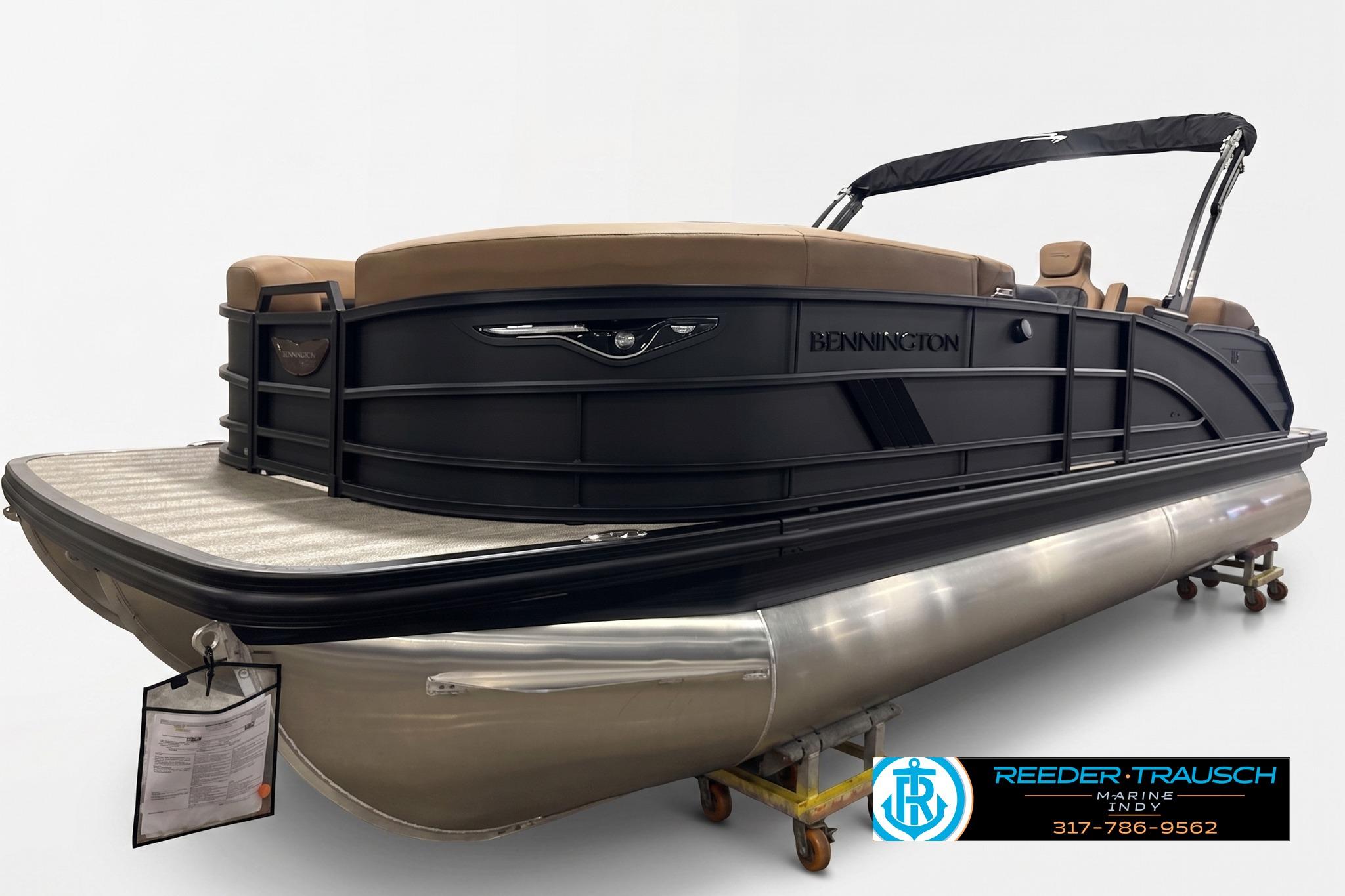 2027 Bennington 24 MSB pontoon boat with sleek black design and tan seating.