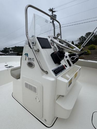 2025 Key West 179 FS boat console with steering wheel and controls.