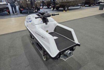 2026 Yamaha WaveRunner SuperJet displayed indoors, showcasing sleek design and advanced features.