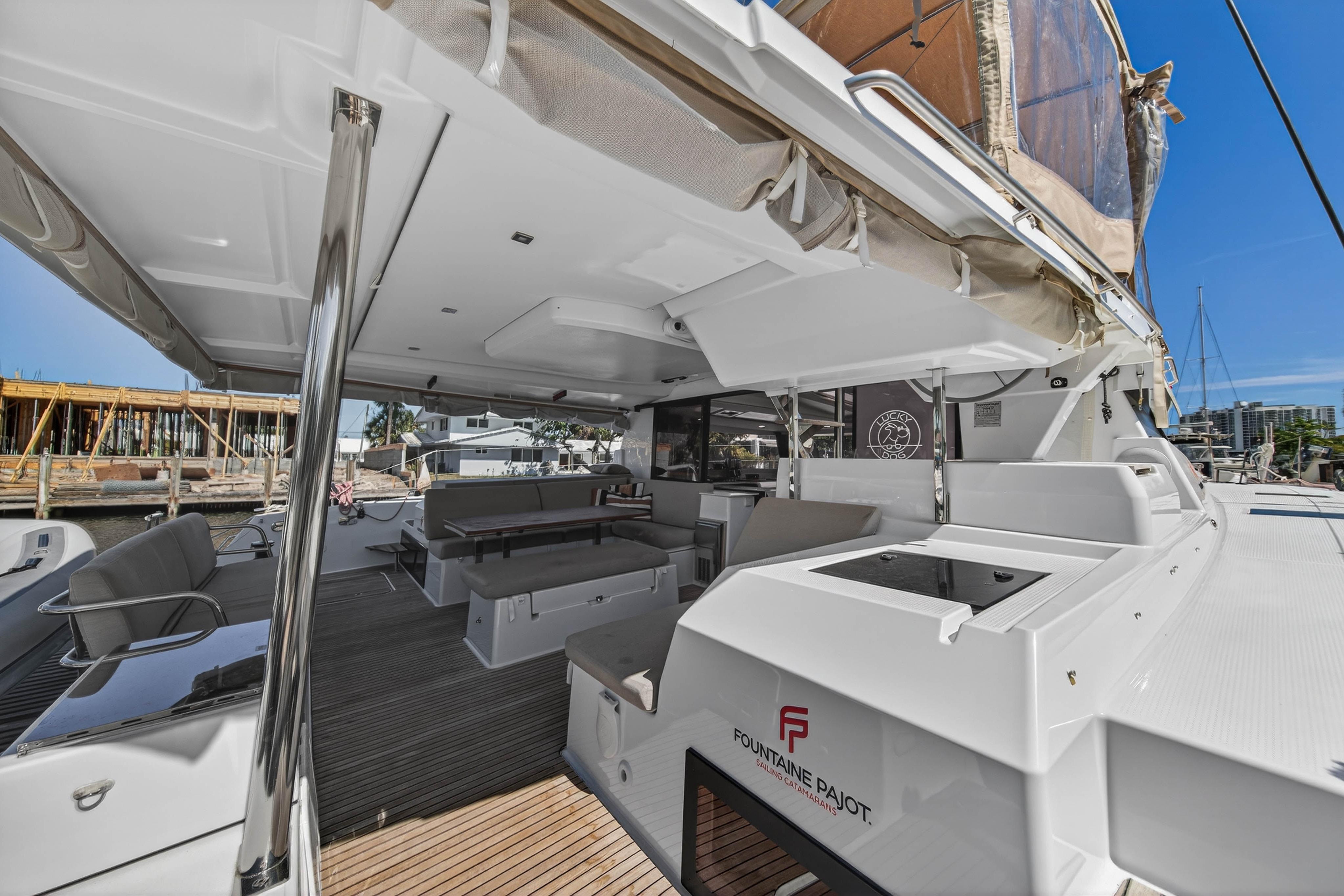 2022 Fountaine Pajot Tanna 47 yacht, spacious deck with seating and modern amenities.