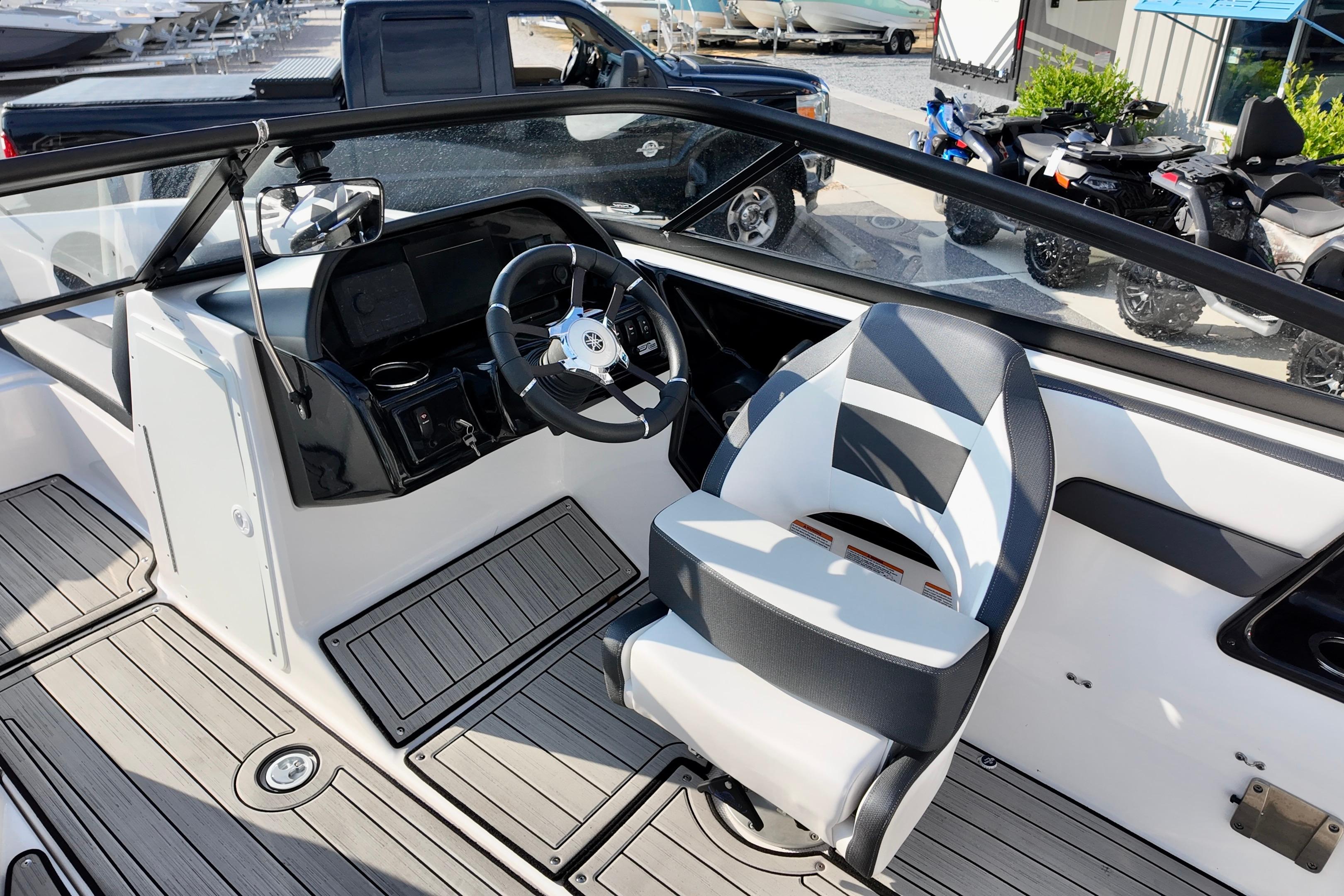 2023 Yamaha 195S boat interior with steering wheel and seating.