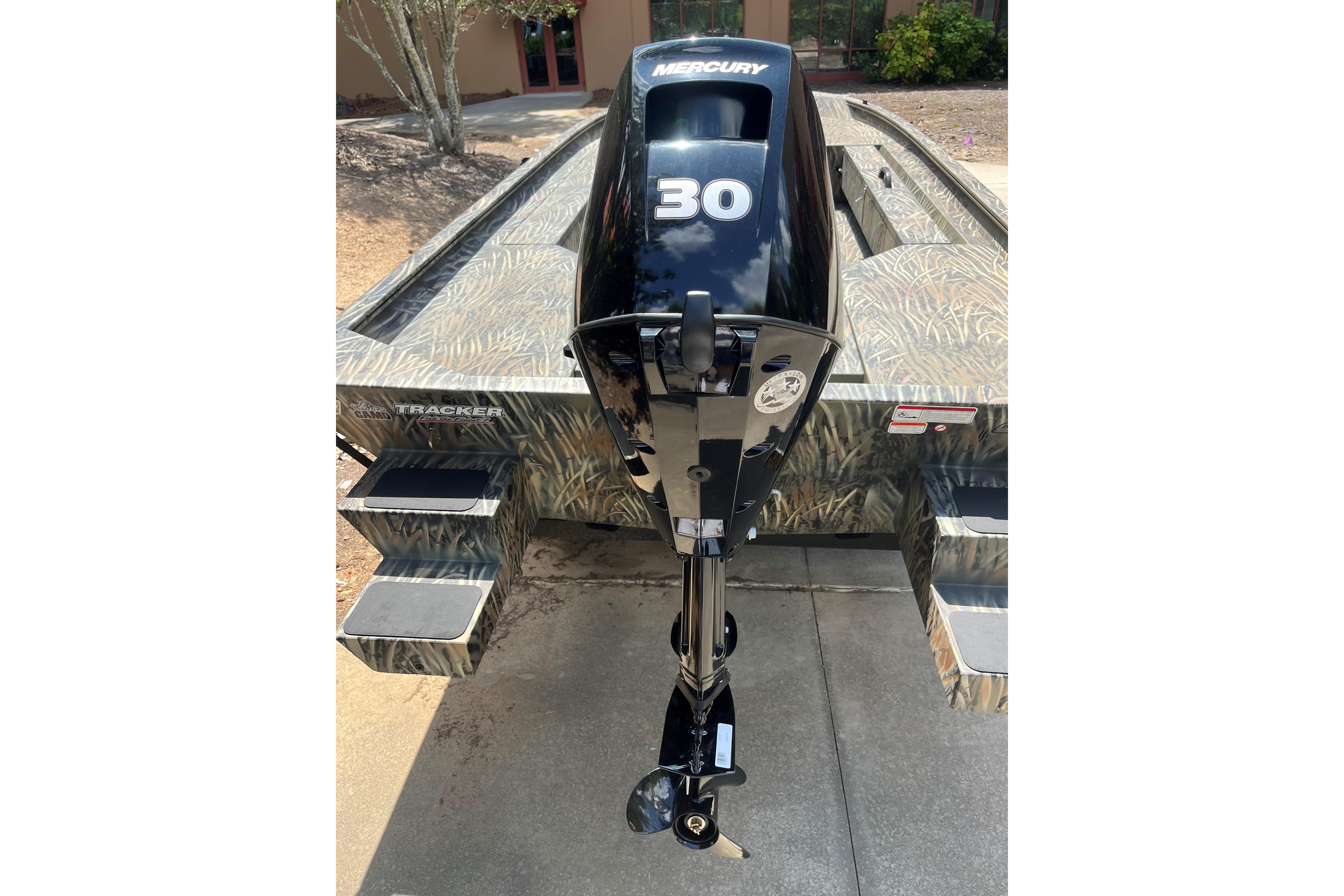 2026 Tracker Grizzly 1654 T Sportsman boat with Mercury 30 outboard motor.