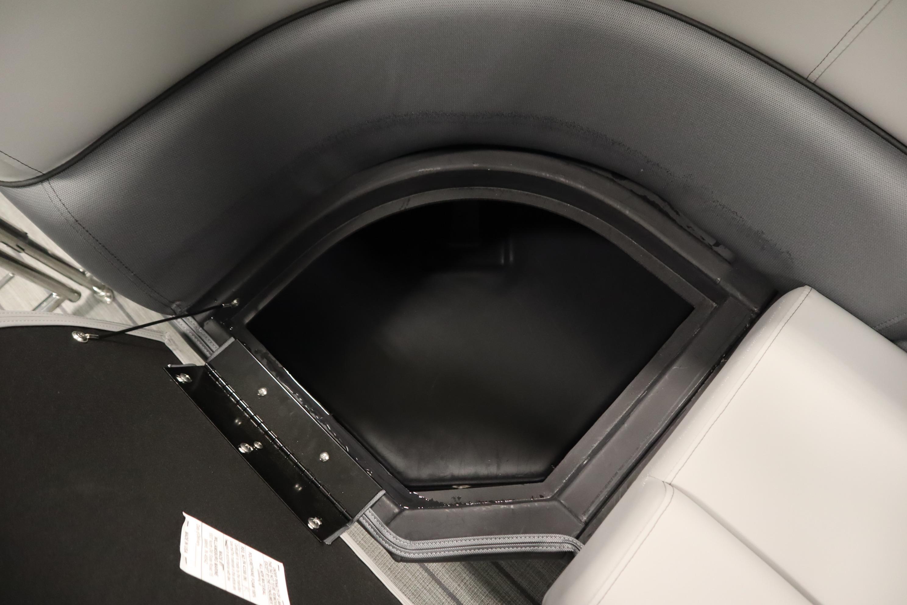 2025 Bentley Pontoons Elite 253 Admiral Tri-toon storage compartment with sleek seating design.