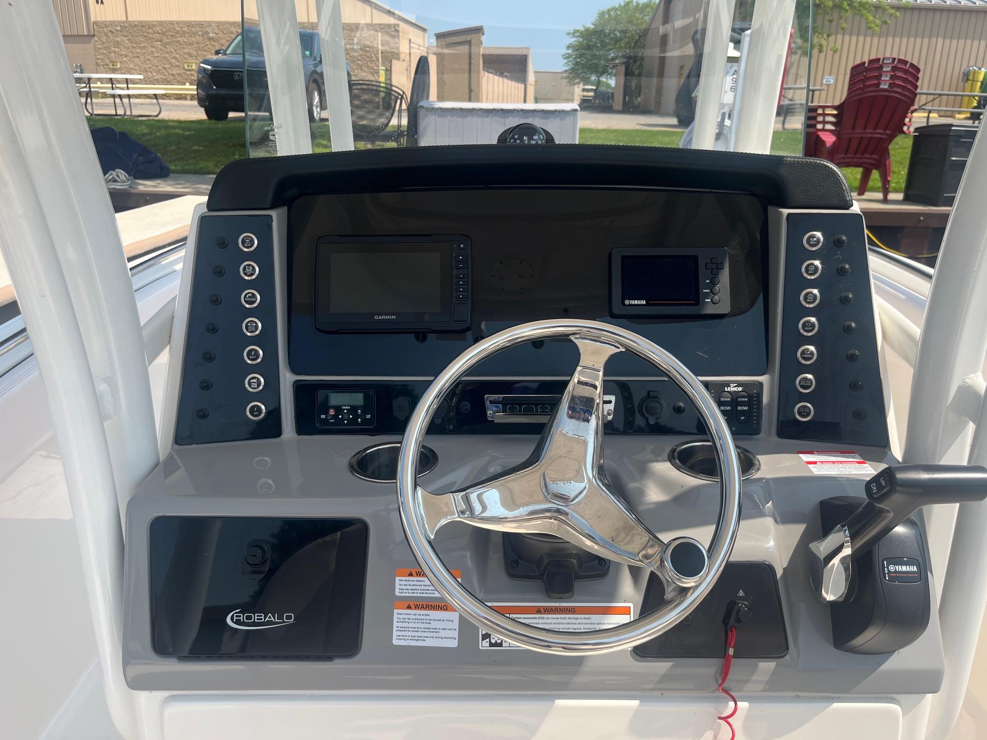 2020 Robalo R230 Center Console dashboard with steering wheel and navigation controls.
