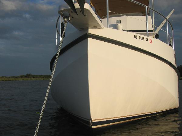 Great Harbour N40 boat anchored on water, showcasing its sleek design, 2025 model.