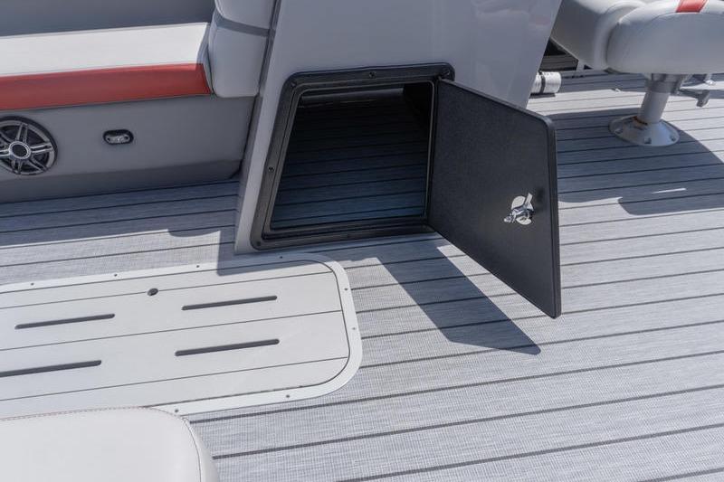 Open storage compartment on 2026 SunCatcher Select 322SL boat deck.