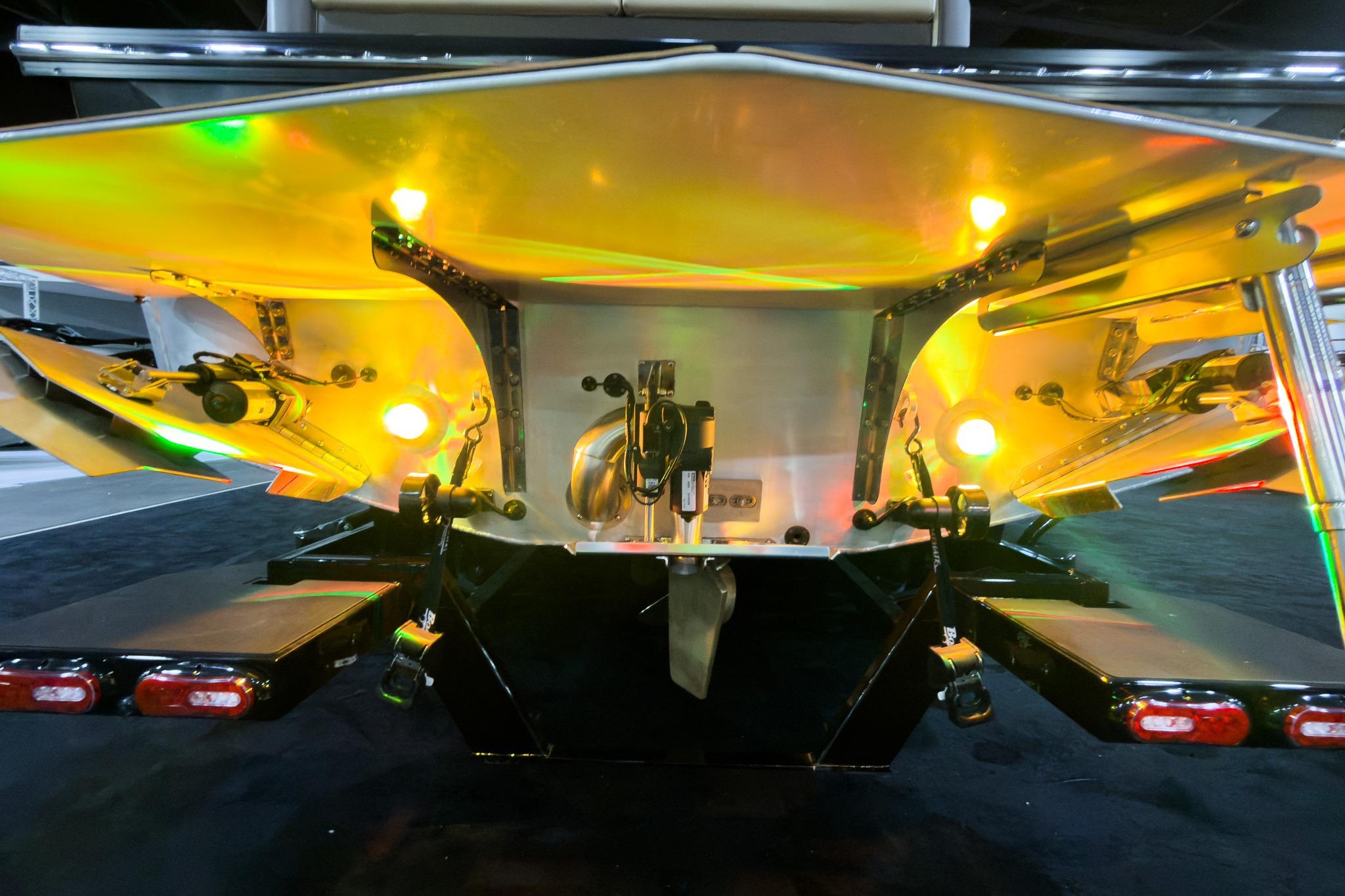 Rear view of 2026 Montara Surf Boss EVO SLDH 25' with illuminated components.