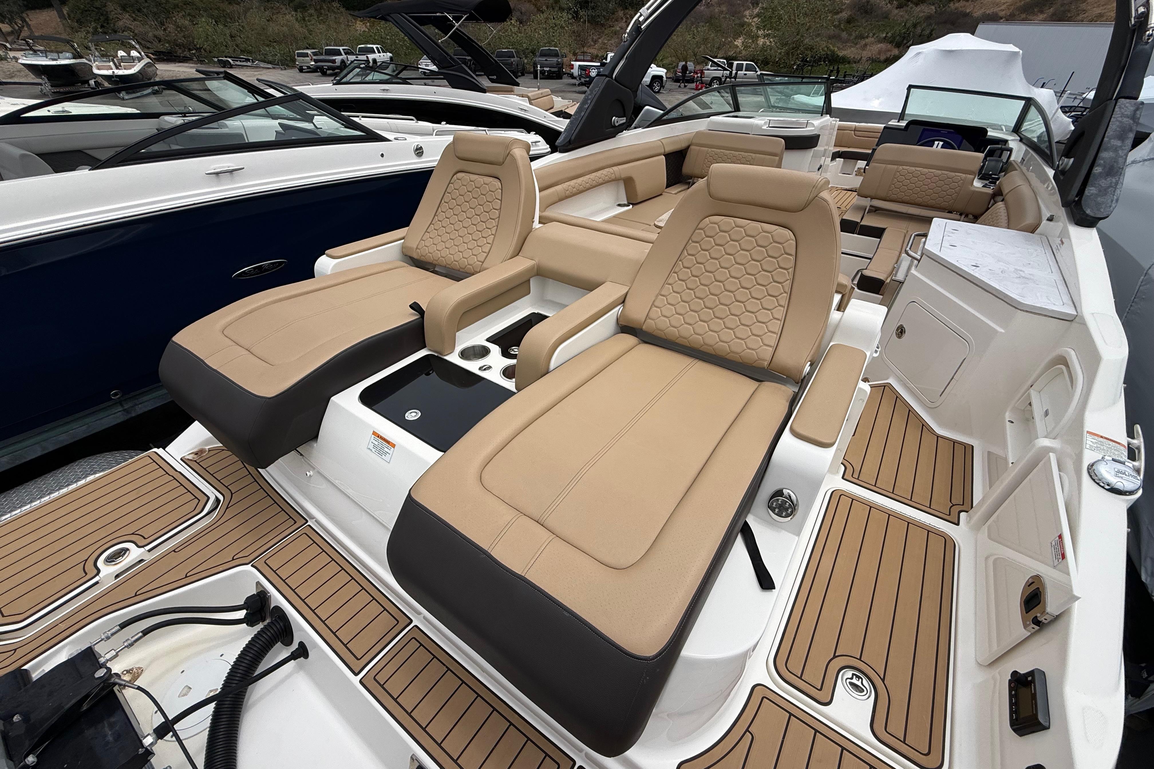 2022 Sea Ray SDX 290 Outboard boat with luxurious tan seating and sleek design.