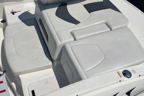 2015 Chaparral 21 H2O Sport boat interior seating, white upholstery, modern design.