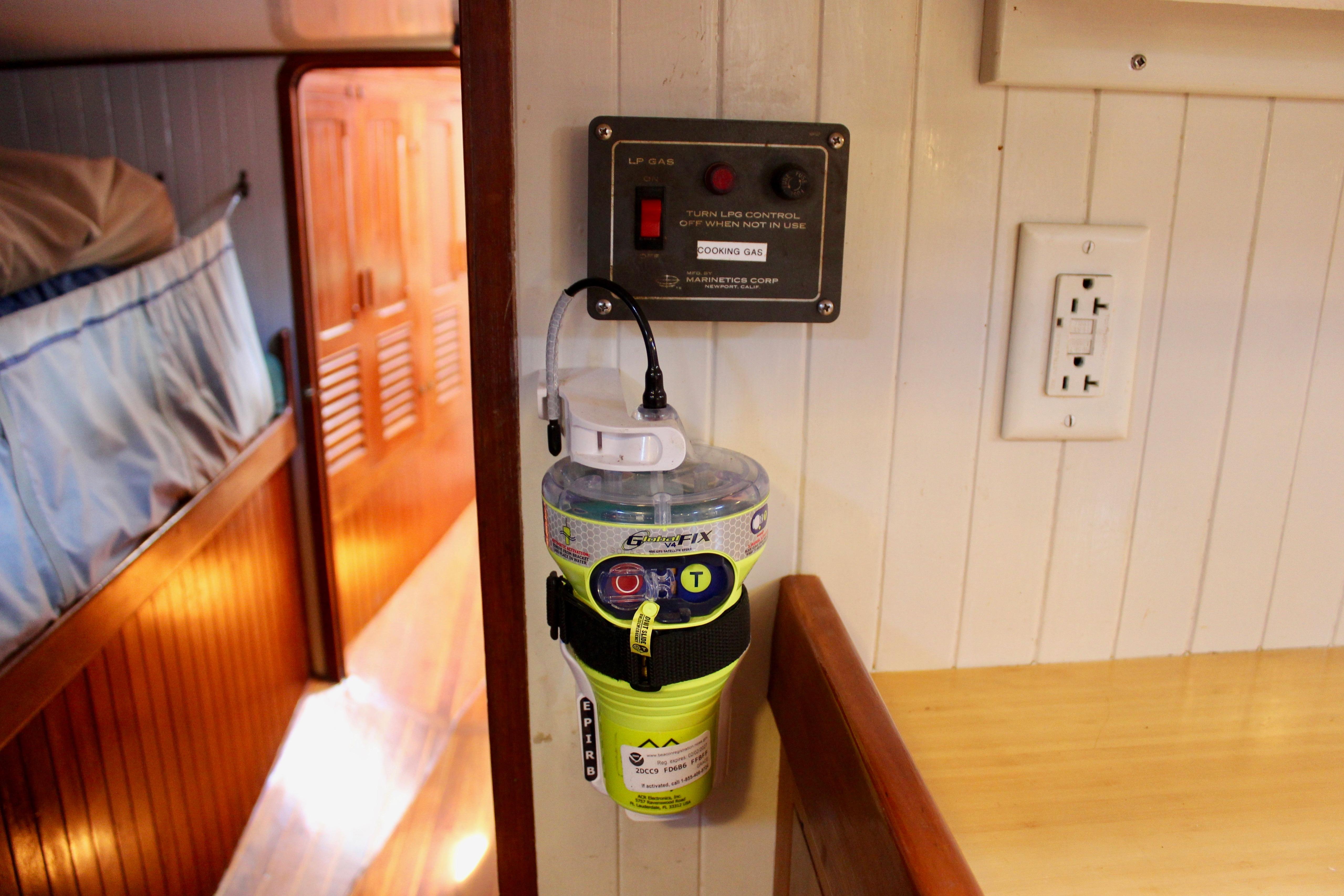 Interior of 1981 Kelly Peterson 46 yacht with EPIRB and gas control panel.