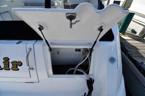 2010 Cruisers Yachts 390 Sports Coupe, open storage compartment on deck.