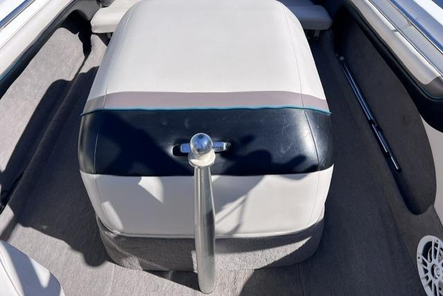 1996 MasterCraft ProStar 190 interior with cushioned seating and sleek design.