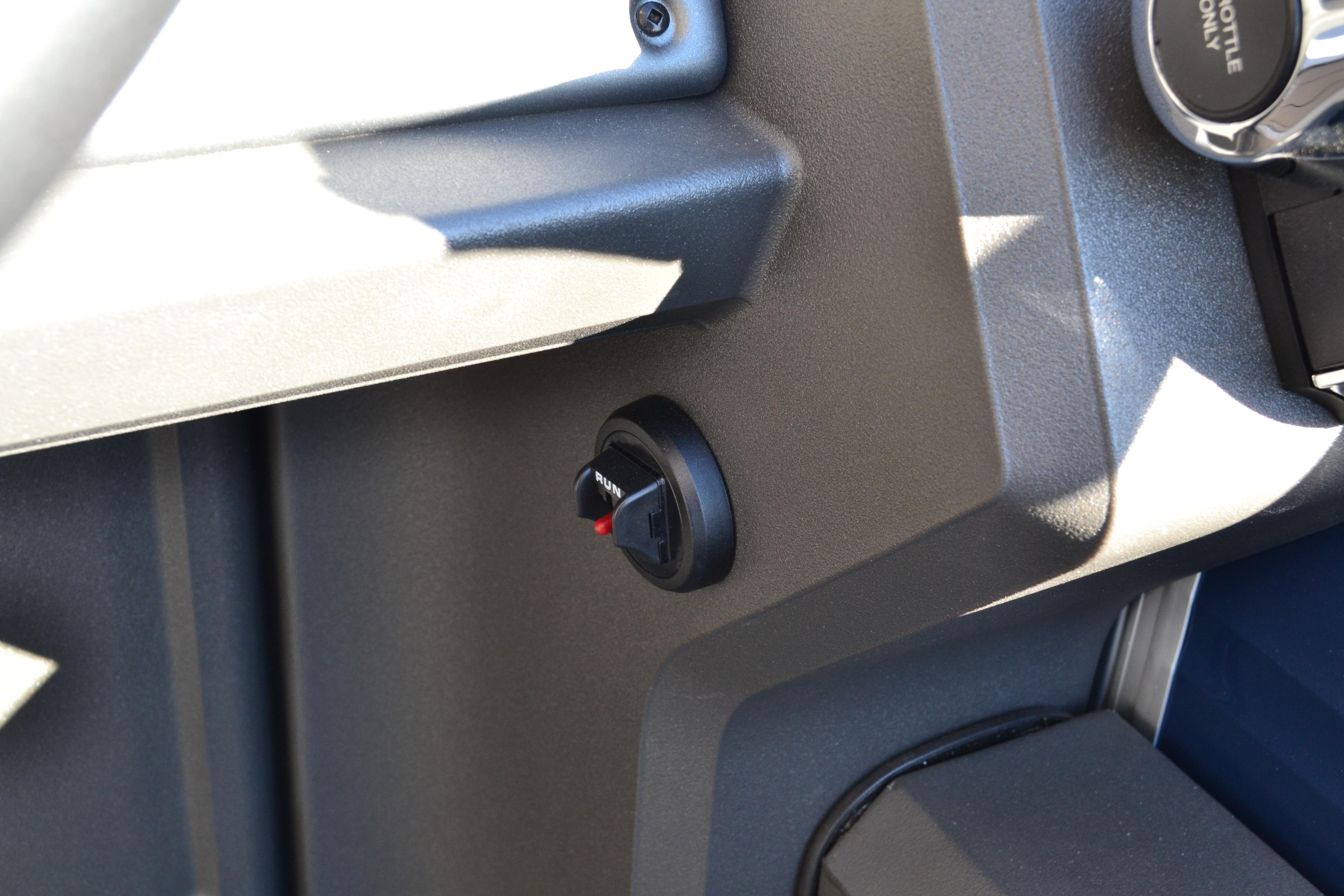Dashboard detail of 2026 Sun Tracker SportFish 22 XP3 boat.