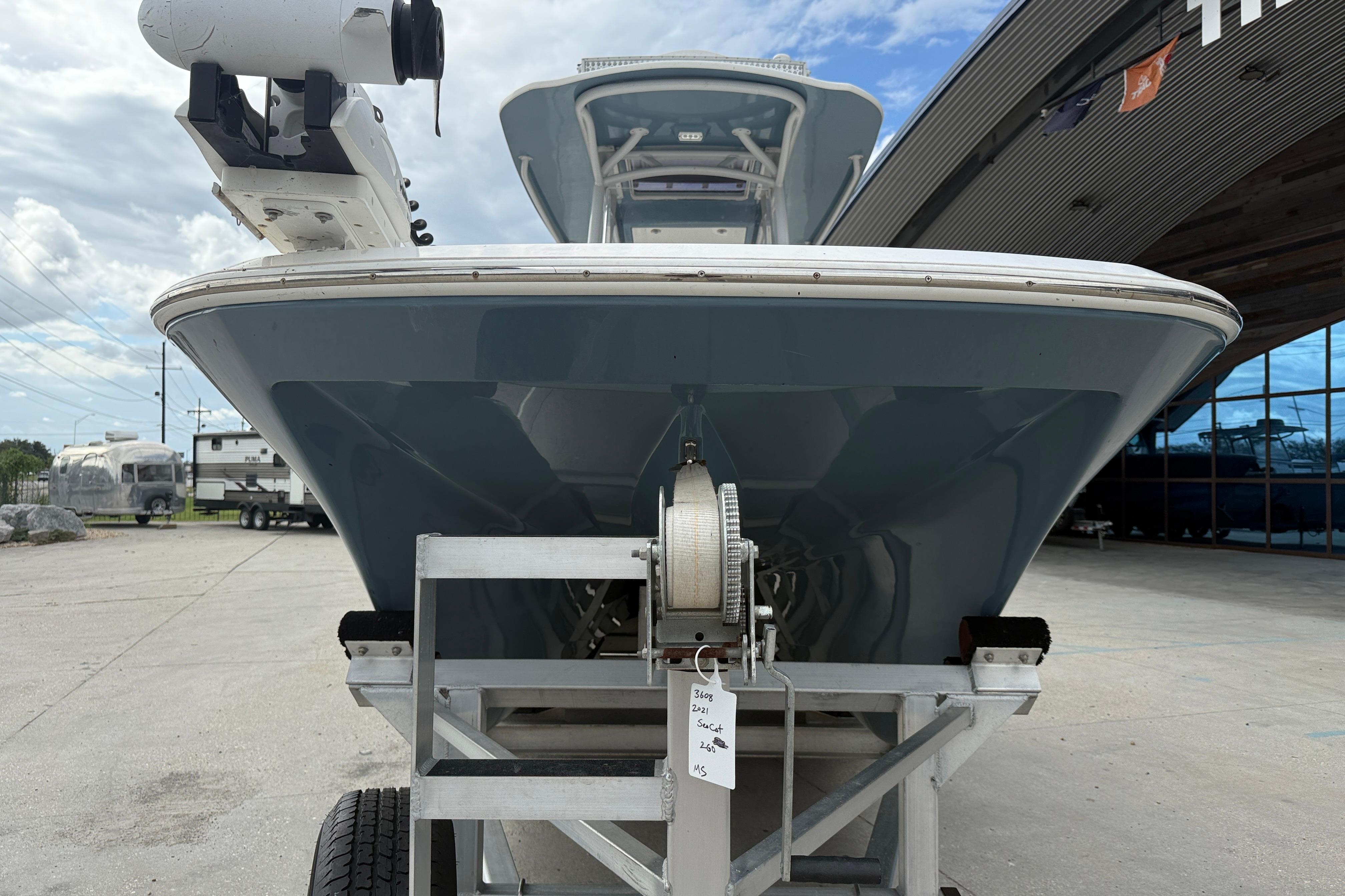 2021 Sea Cat 260 boat on trailer, front view, outdoors.