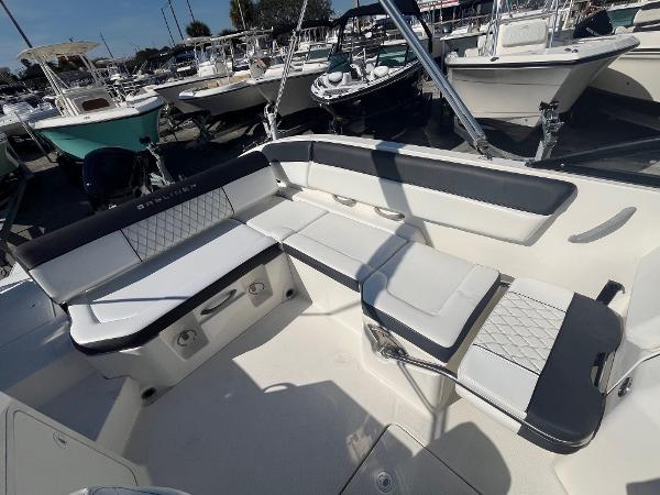 2021 Bayliner DX 2200 boat interior with spacious seating and modern design.