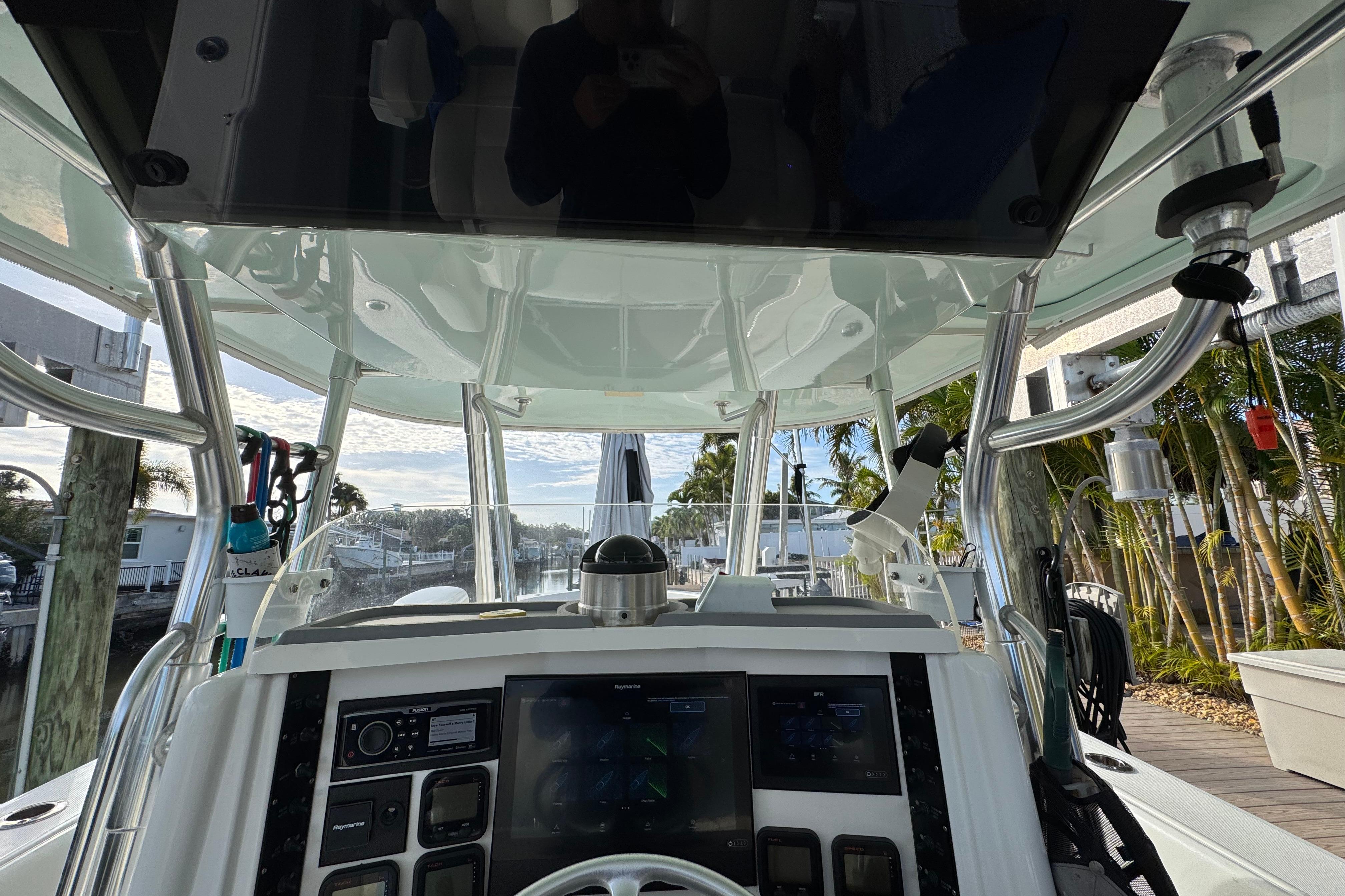 2009 Venture 39 Center Console boat cockpit with advanced navigation system and controls.