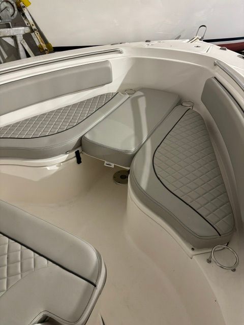 Interior of 2022 Pursuit C 238 Center Console with cushioned seating.