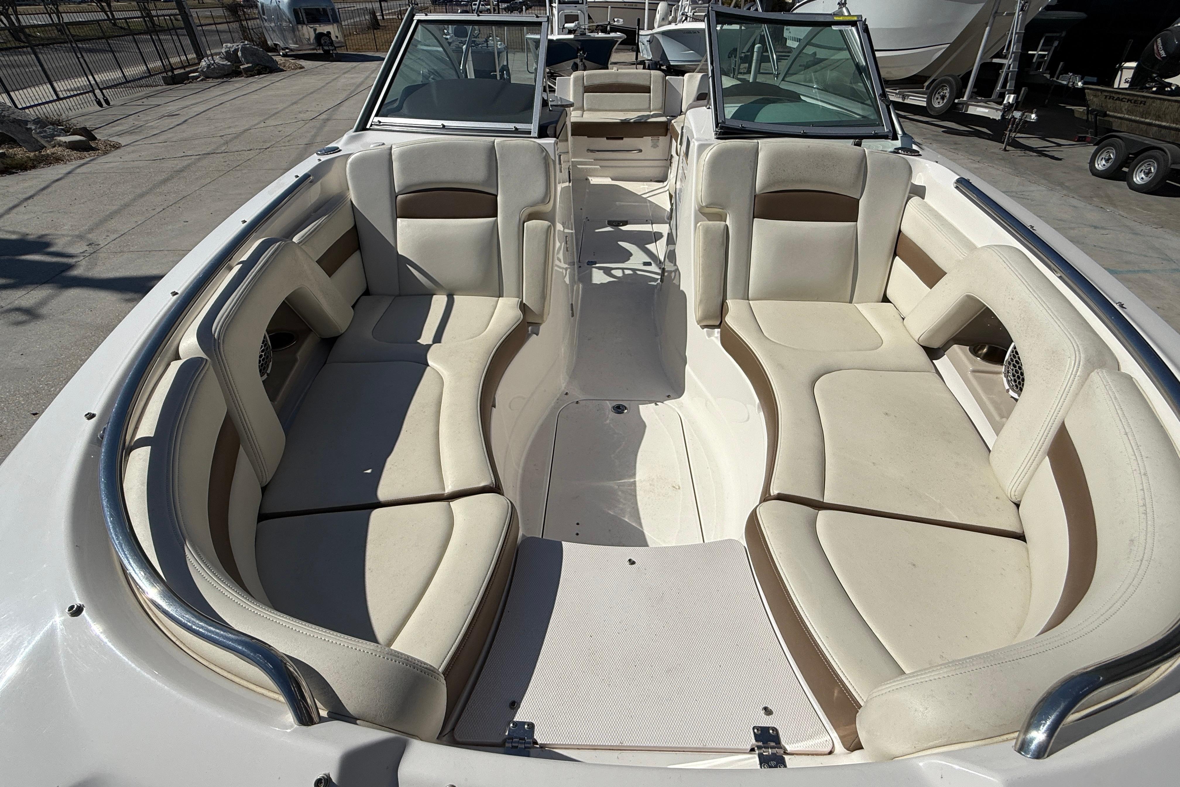 2014 Chaparral 264 Sunesta boat interior with spacious seating and sleek design.