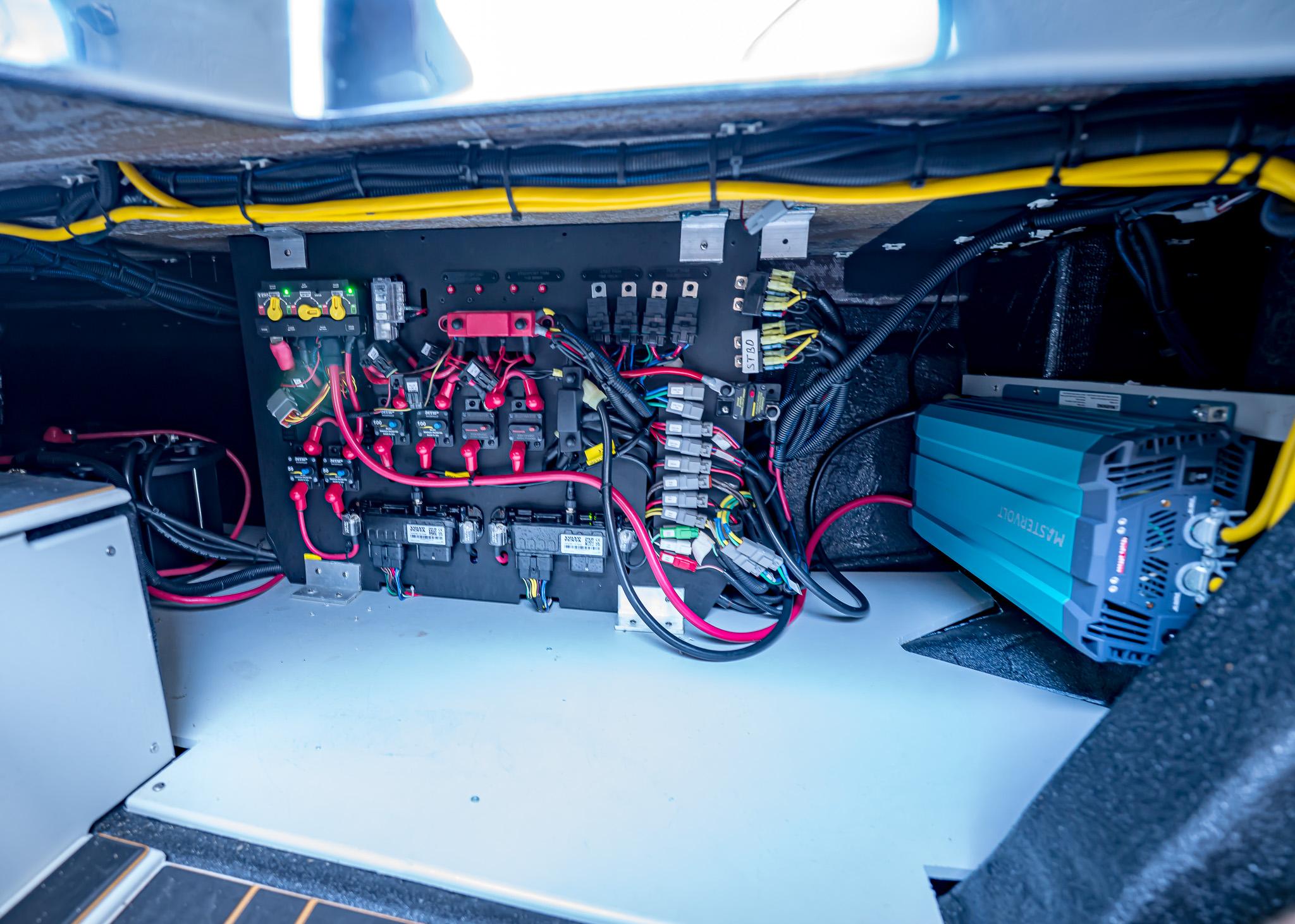 Electrical system of Paradigm 236, 2025 model, featuring wiring and components.