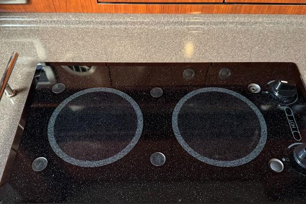 Stovetop on 2004 Sea Ray 390 Sundancer yacht kitchen counter.