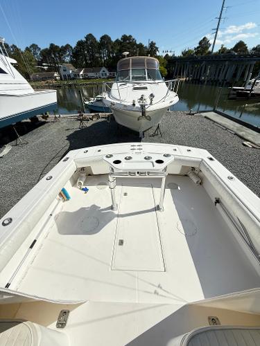 2001 Albemarle 280 Express Sport Fisherman boat docked, showcasing spacious deck and fishing amenities.