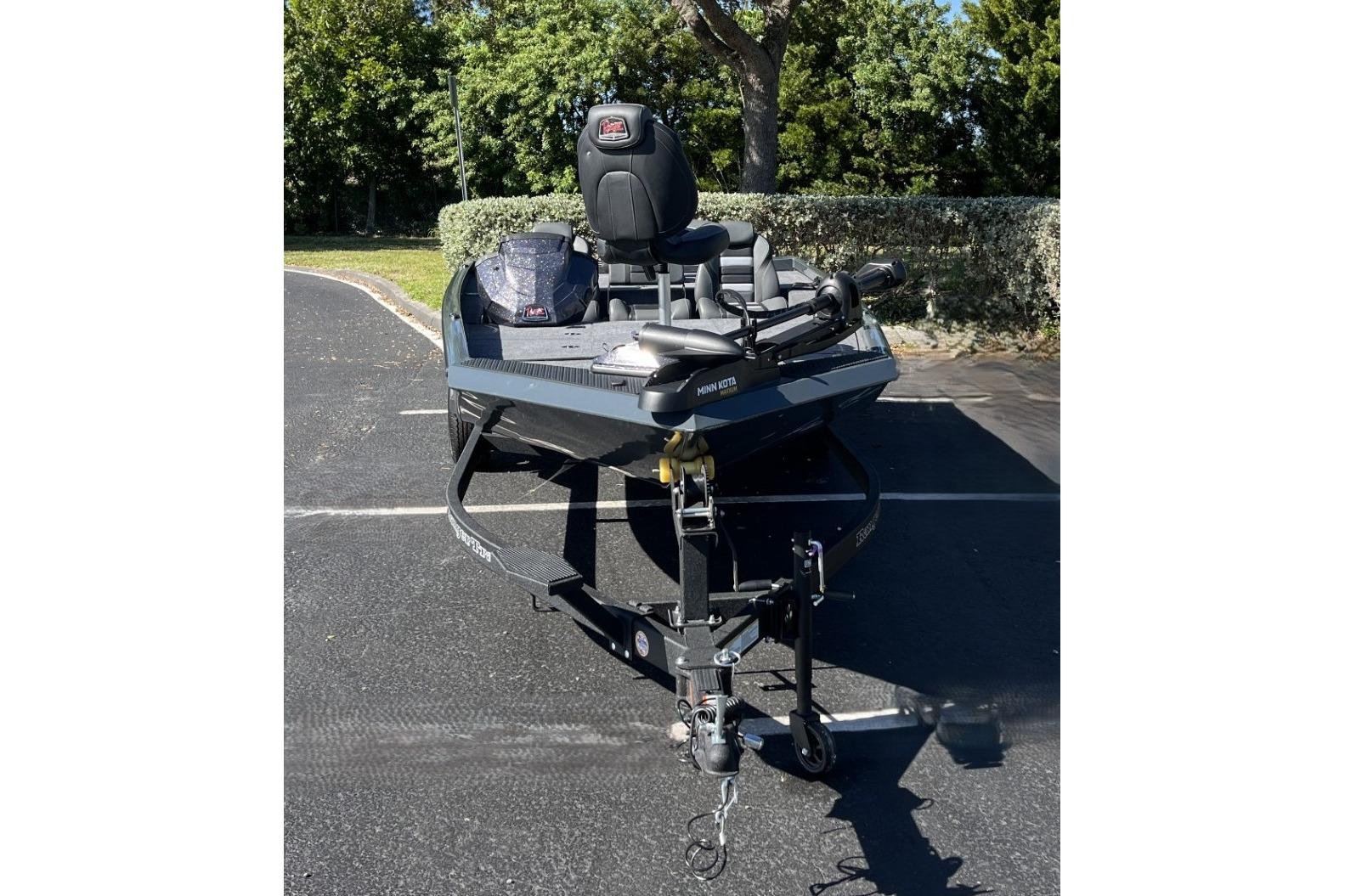 2026 Ranger RT188P fishing boat on trailer, parked outdoors.