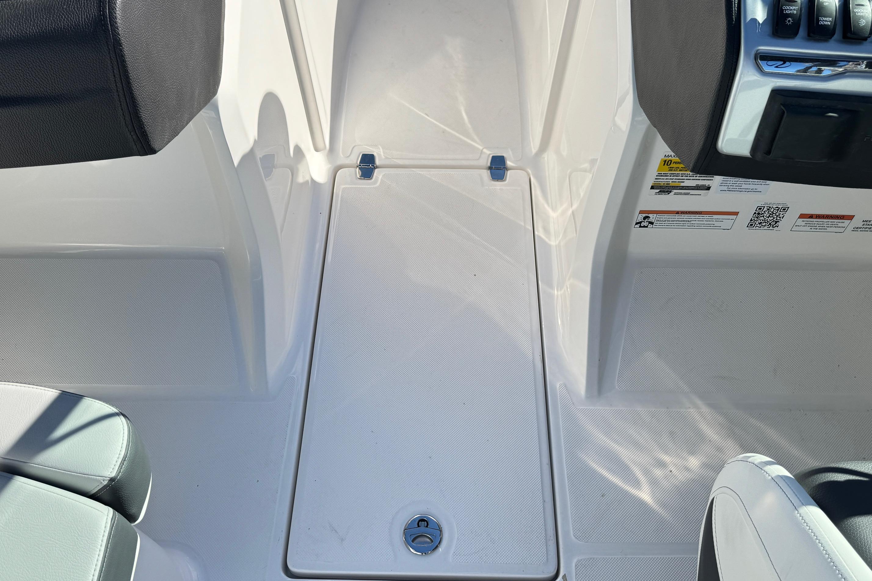 2026 Regal 21 OBX boat interior with seating and control panel.