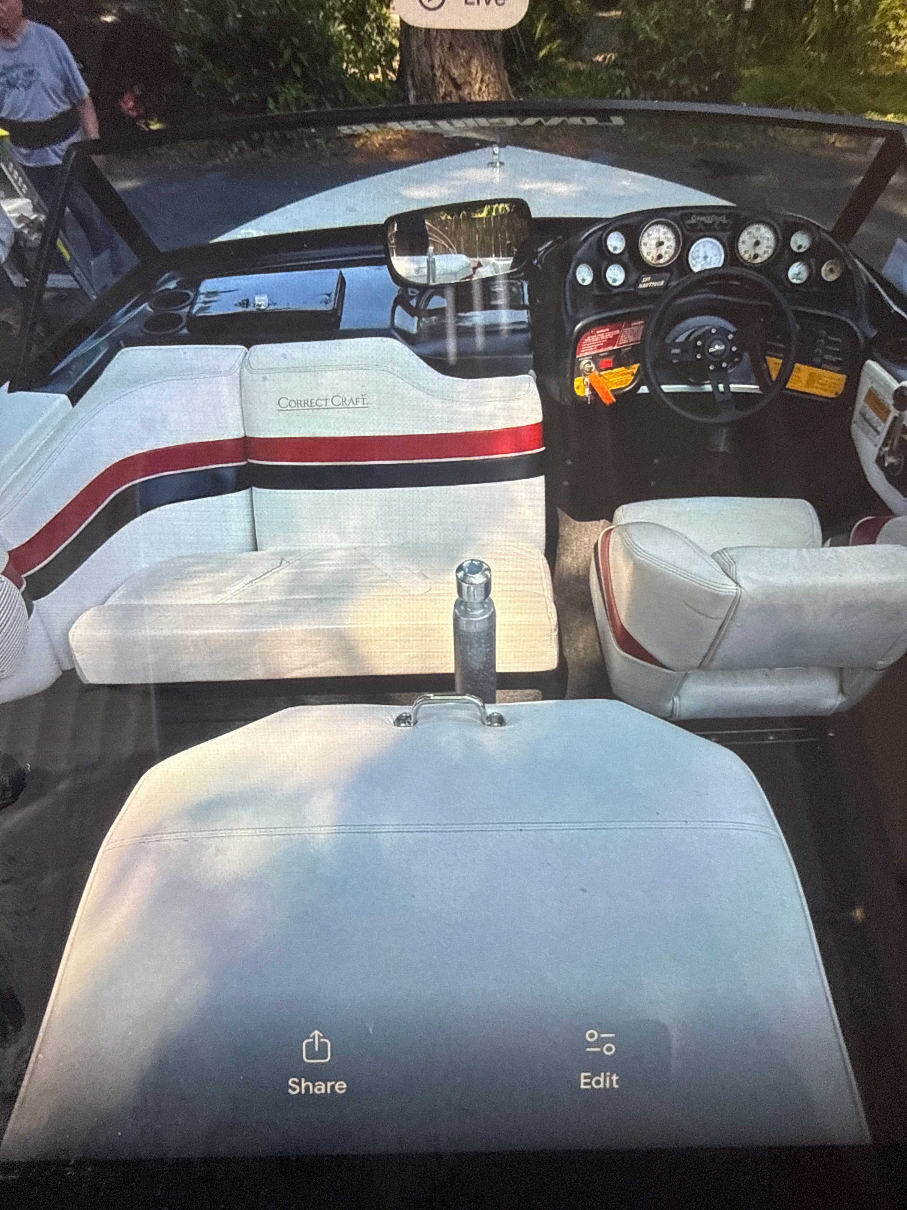 Interior of a 1990 Correct Craft Ski Nautique boat with dashboard.