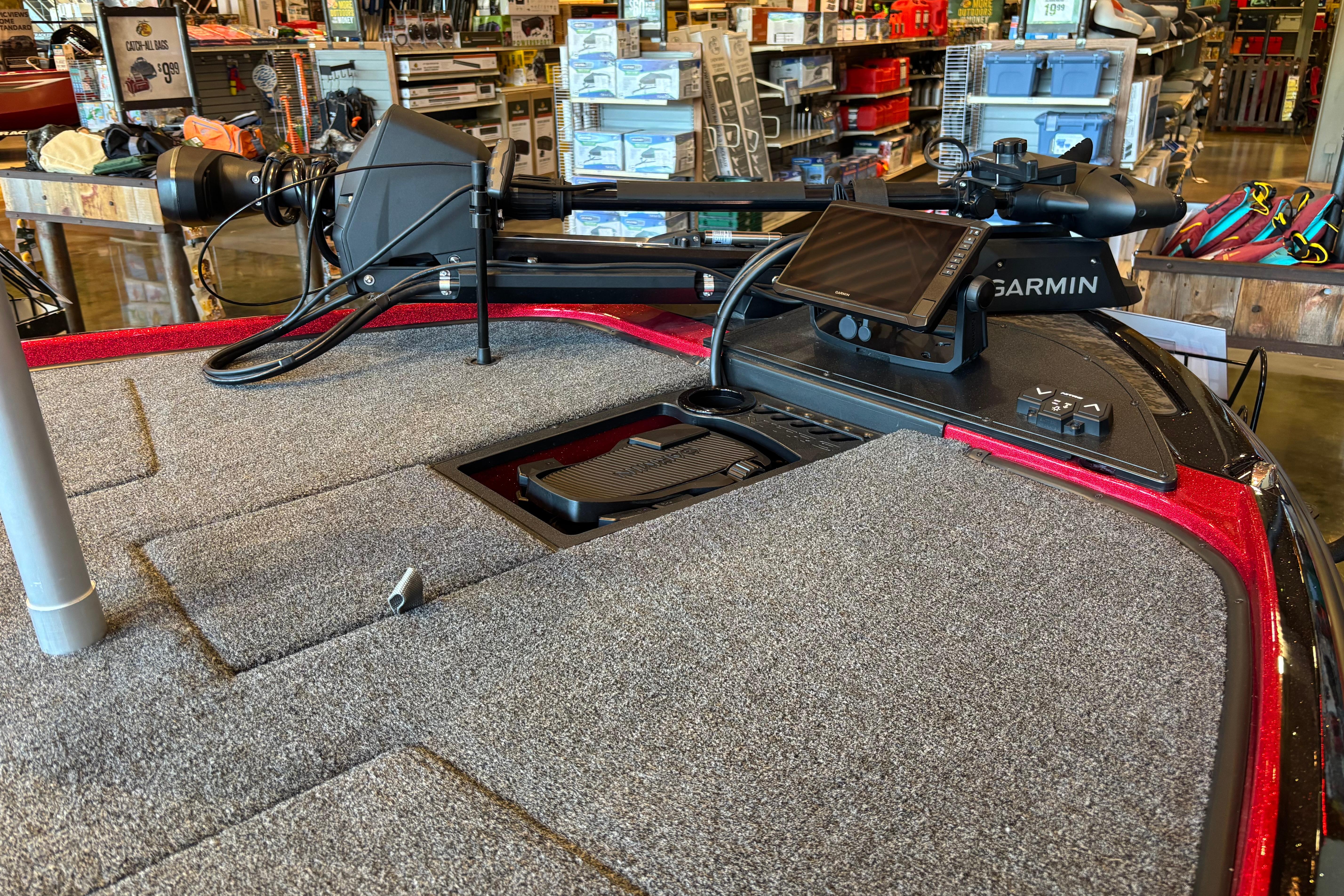 2026 Nitro Z20 XL Pro boat with Garmin electronics in a showroom setting.