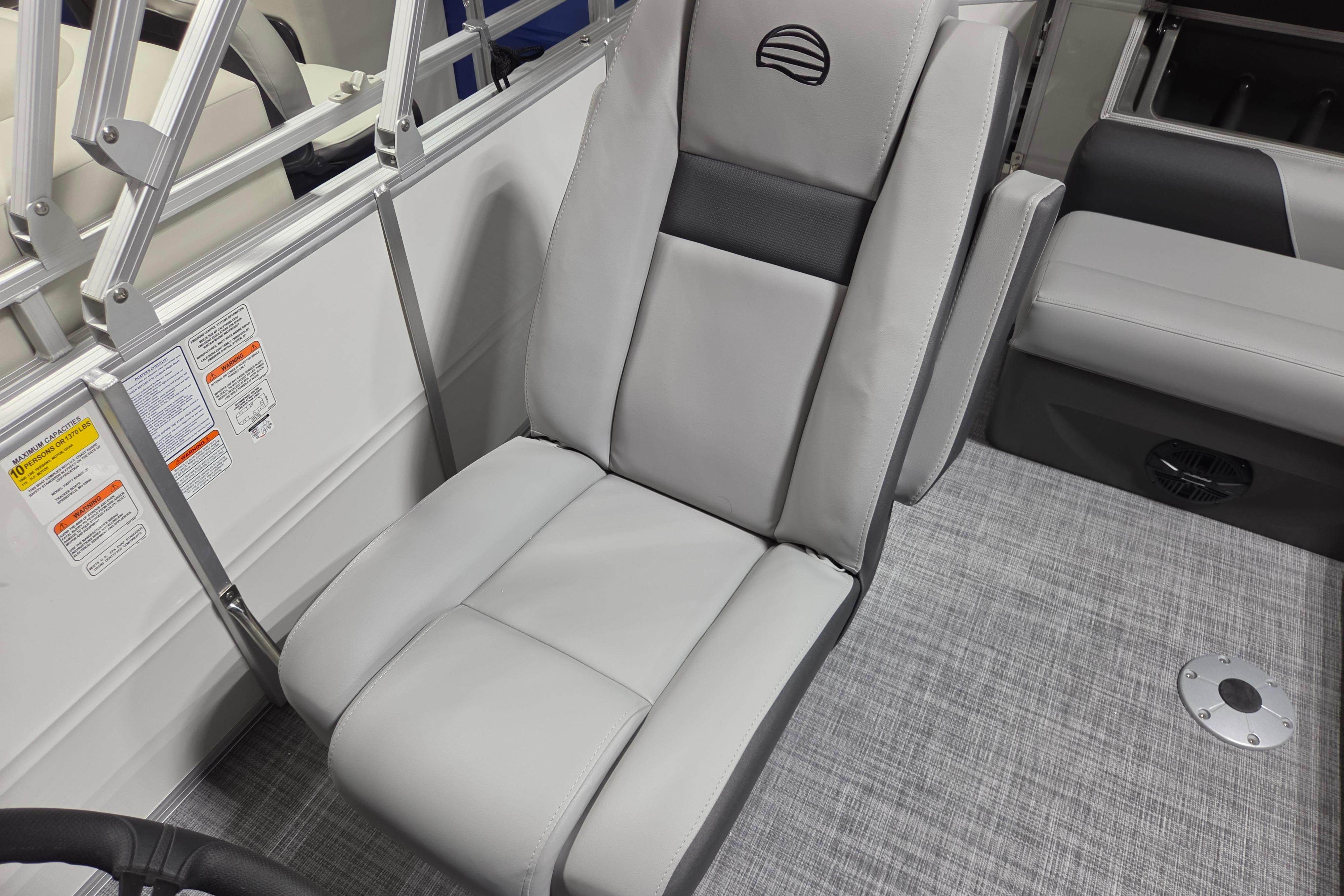 2026 Sun Tracker Party Barge 20 DLX interior with gray seating and modern design.