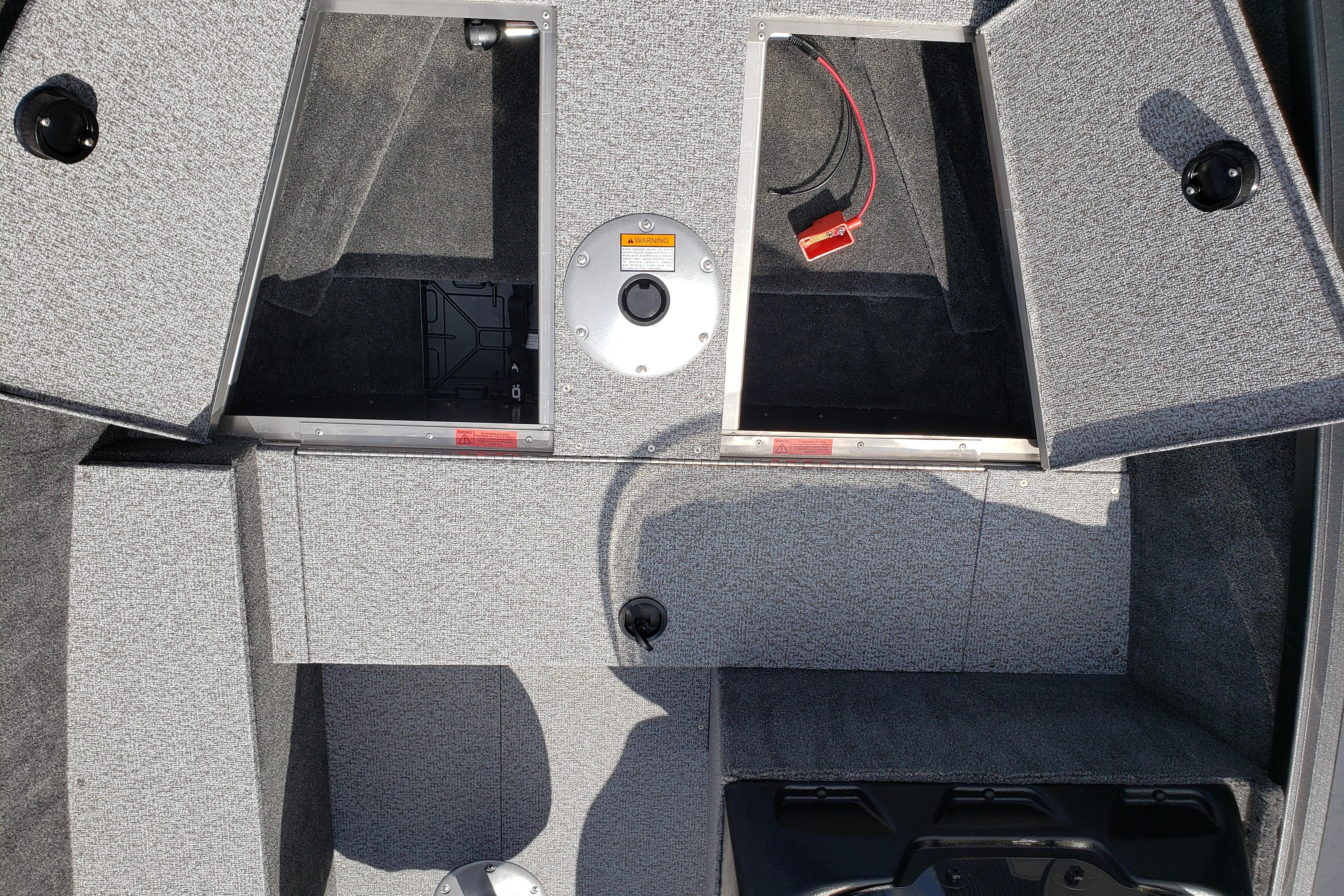2026 Alumacraft Escape 165 CS boat interior with open storage compartments.