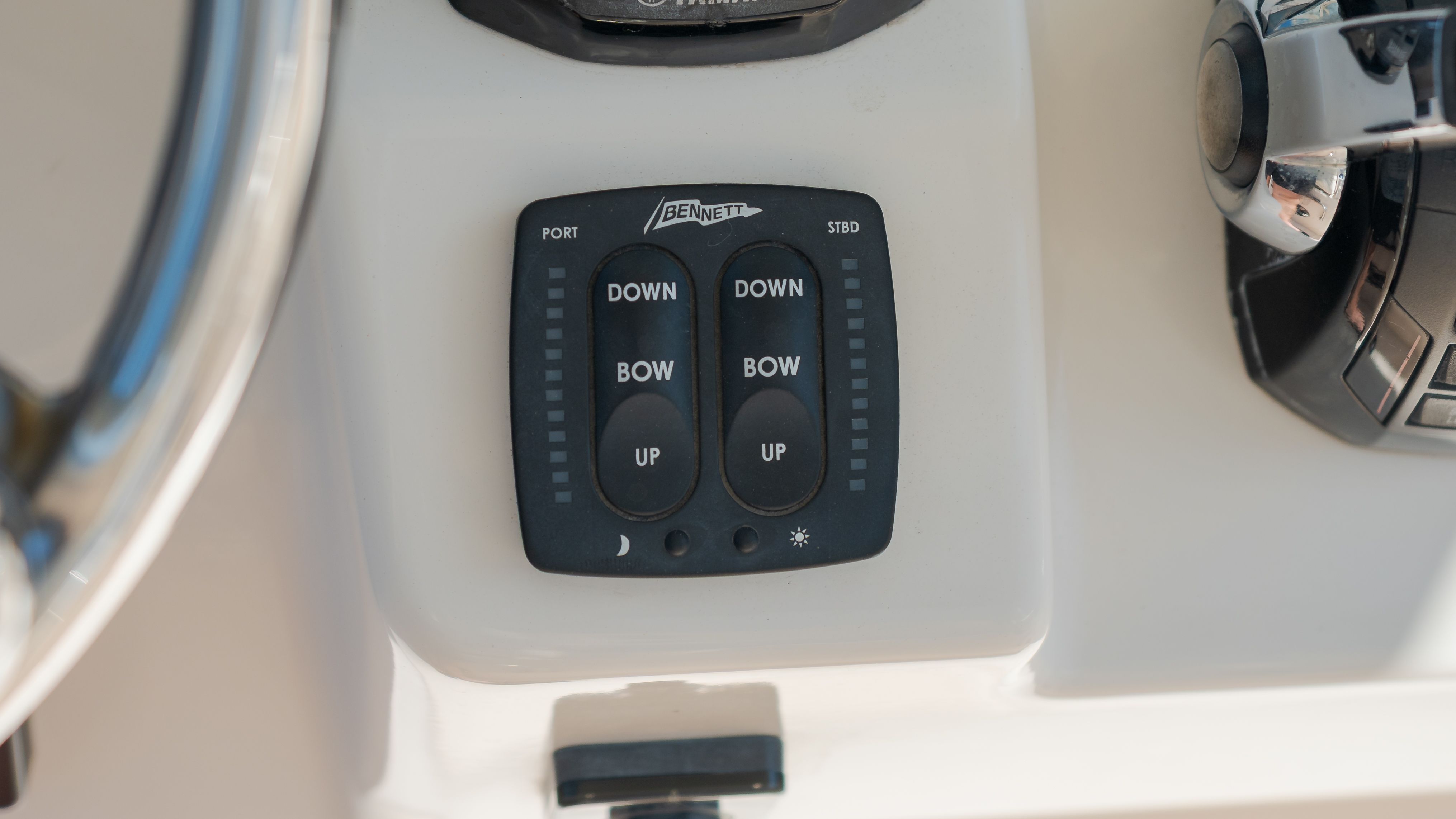 Trim tab control on Grady-White Canyon 306 boat, year 2019.