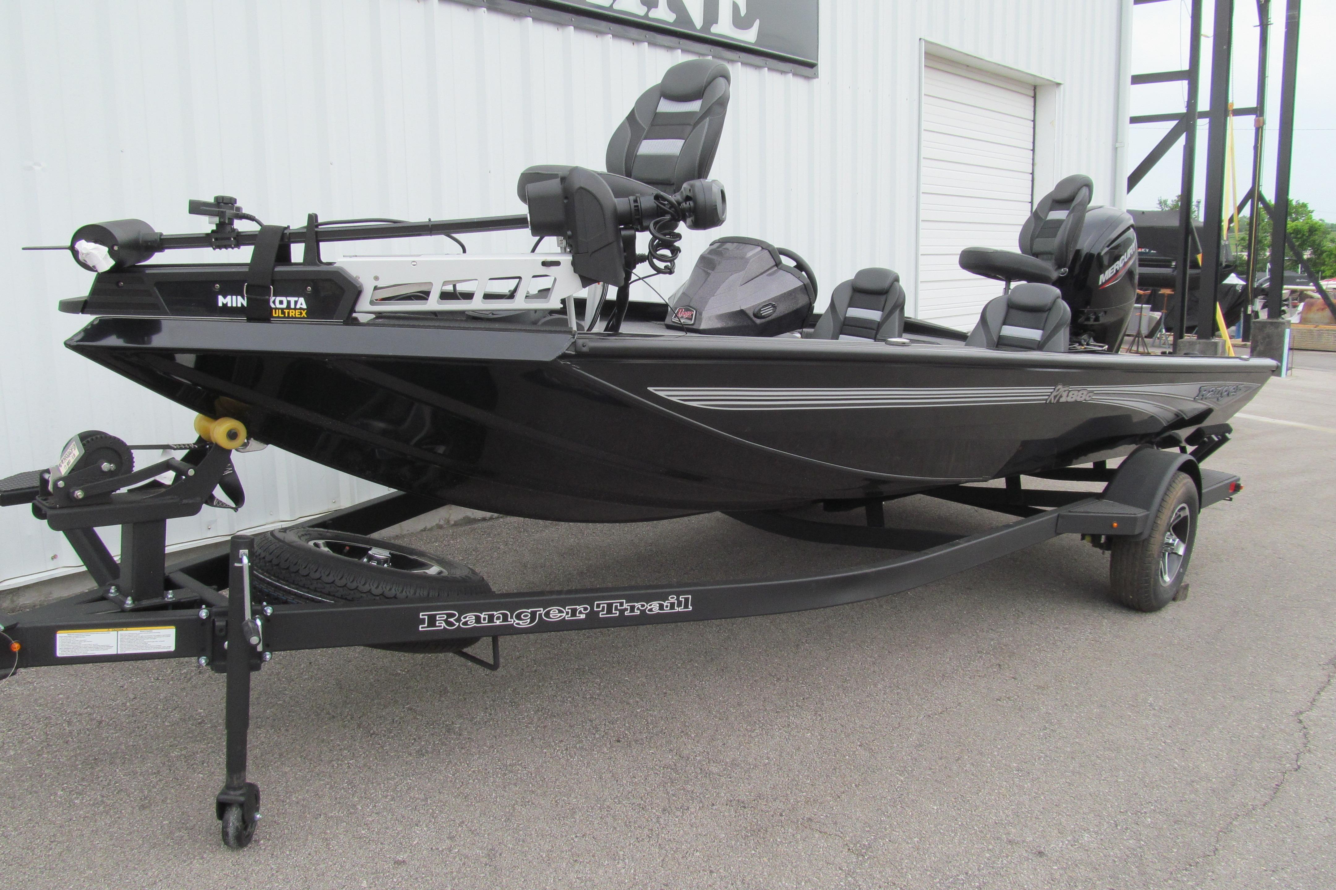 2026 Ranger RT188C fishing boat on trailer, parked outdoors.