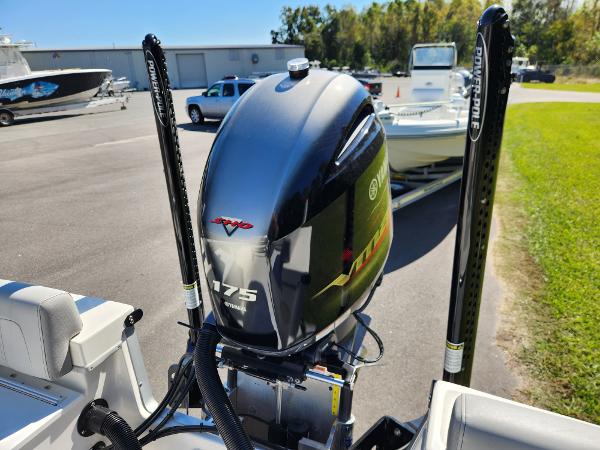 2023 May-Craft 208 CC boat with Yamaha 175 engine in a marina setting.