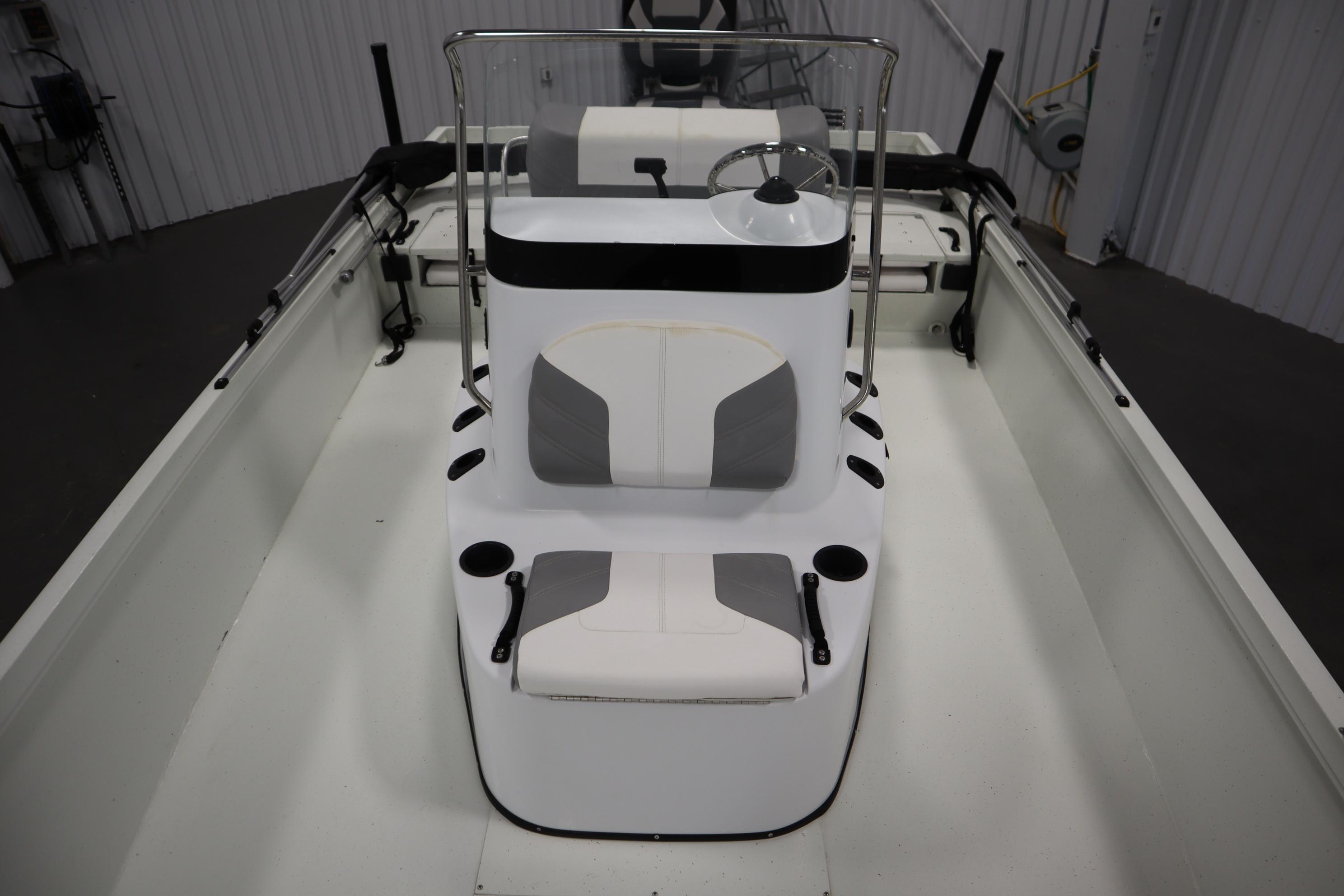 2022 Crestliner 2200 CC boat interior with steering console and seating.