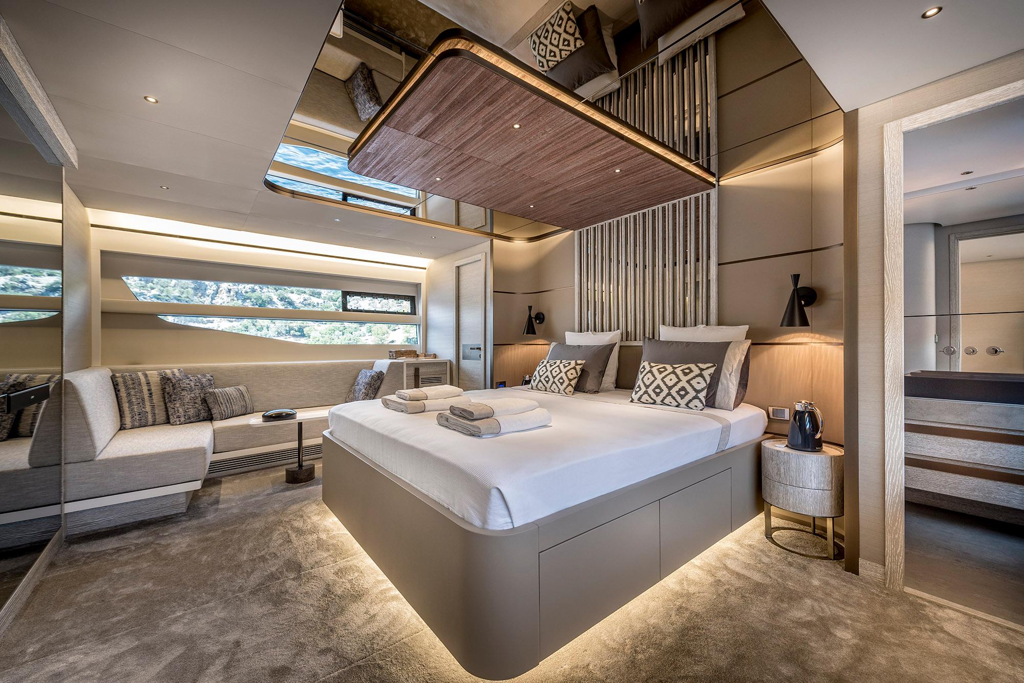 Luxurious interior of 2025 Numarine 26XP yacht with modern bedroom design.