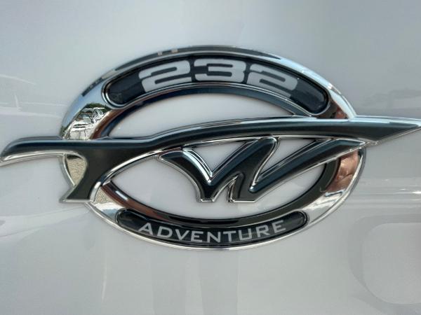 2025 Tidewater 232 CC Adventure logo on a sleek white surface.
