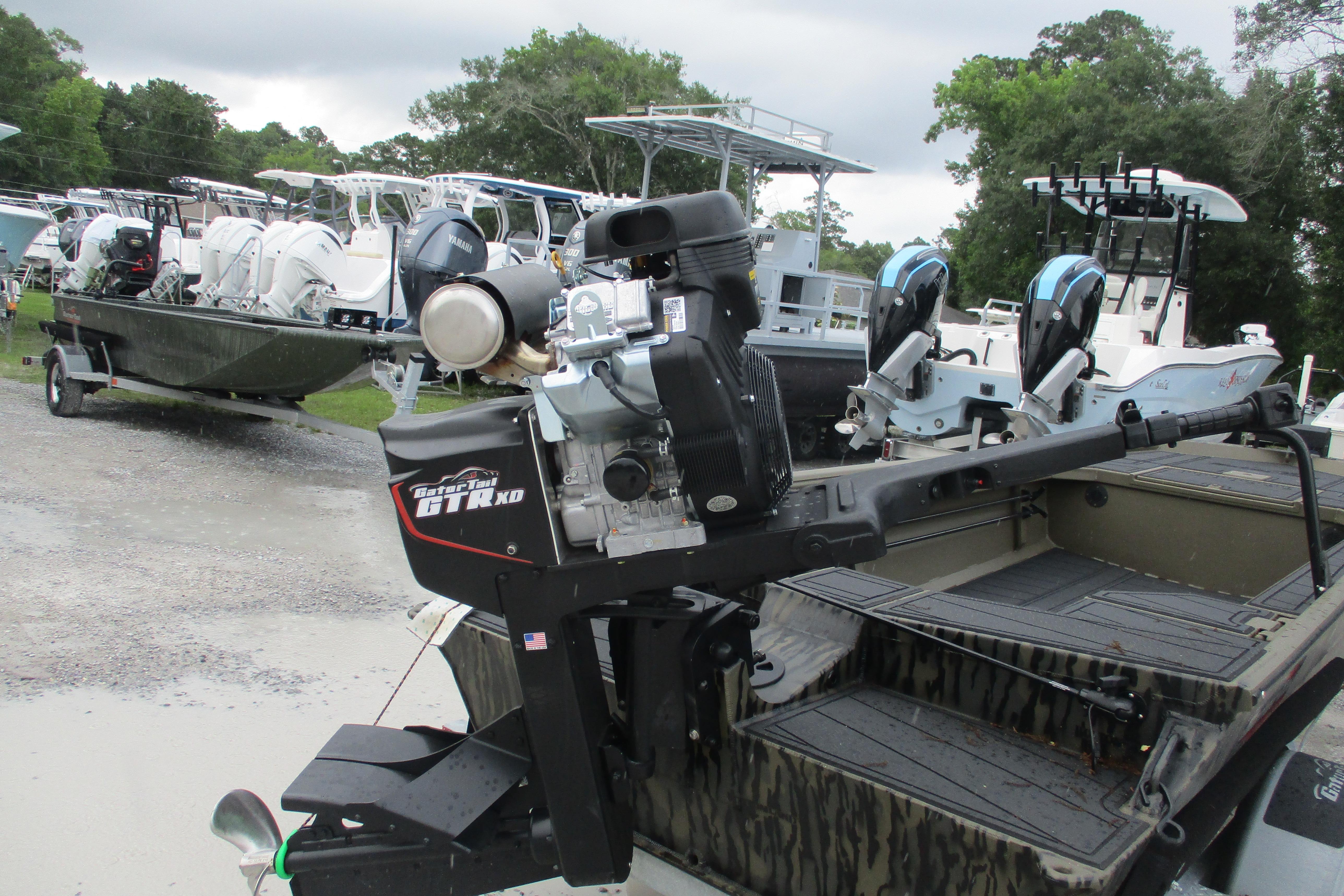 2026 Gator Tail 1854 Extreme boat with powerful outboard motor in a marina setting.