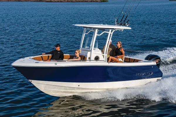 Manufacturer Provided Image: 2025 Robalo R230 Center Console boat cruising on open water with passengers.