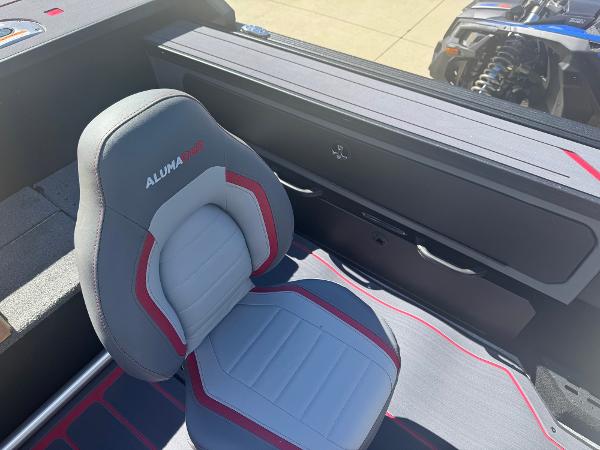 2025 Alumacraft Trophy 185X SC Rotax S boat interior with gray and red seating.