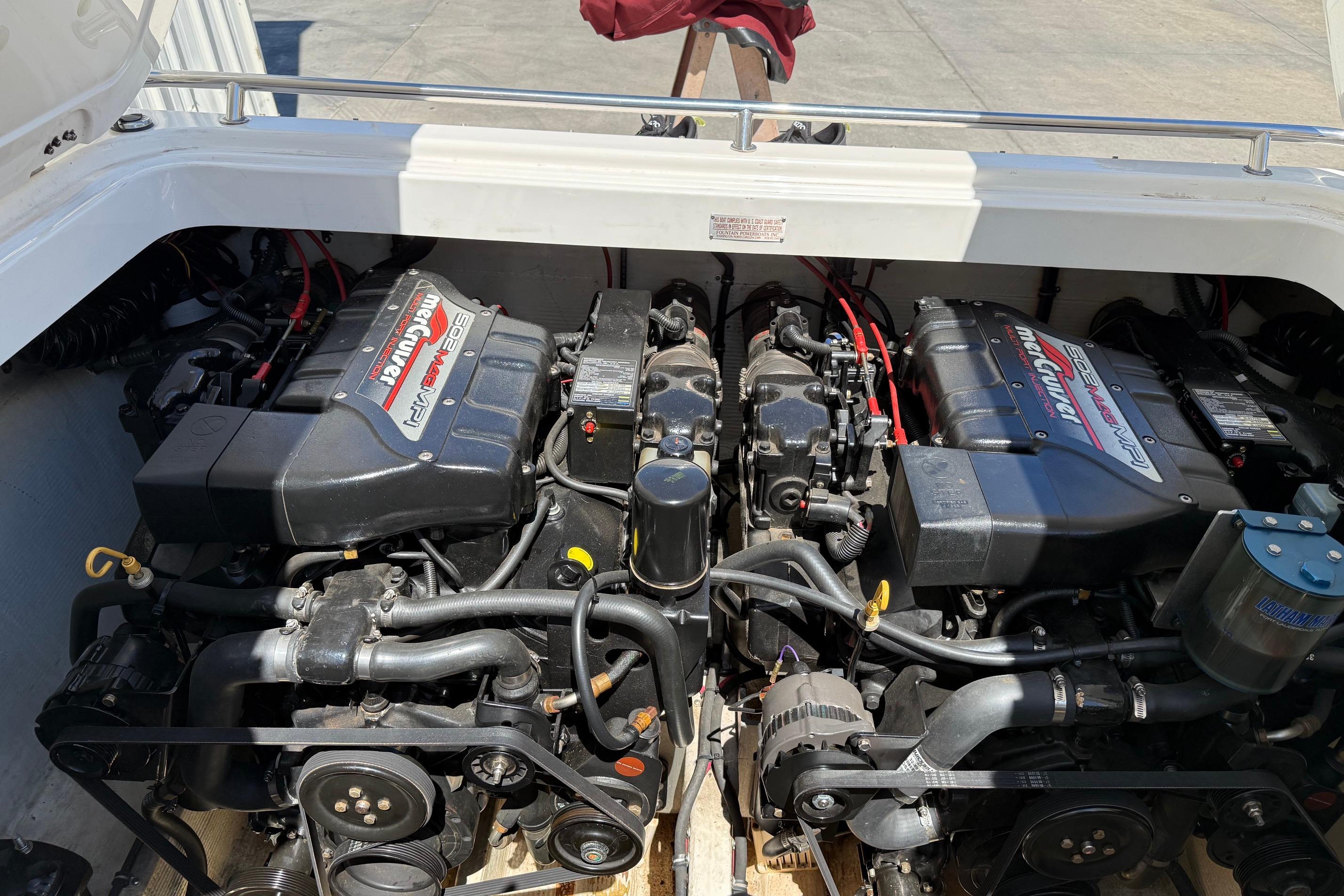 Engine compartment of a 1998 Fountain 35 Lightning boat with twin MerCruiser engines.