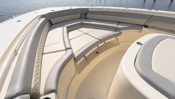 Luxurious seating area on 2025 Scout 425 LXF boat, featuring elegant upholstery.