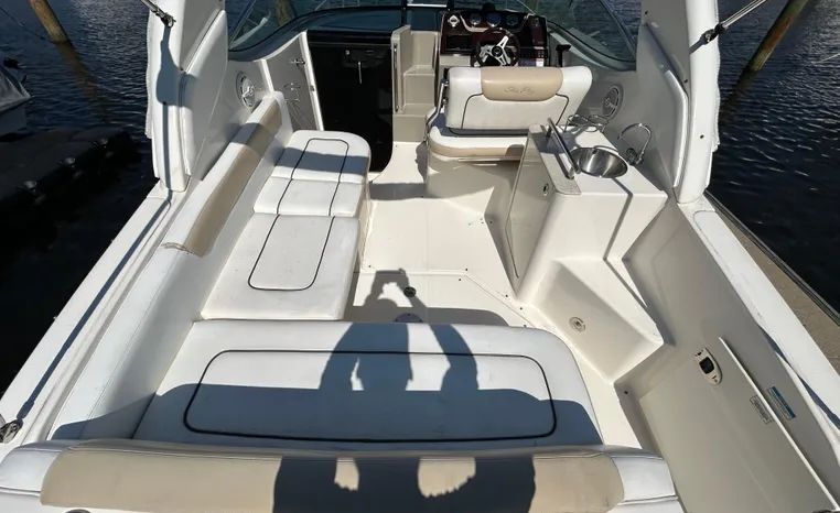 Interior of a 2010 Sea Ray Sundancer 260 yacht with seating area.