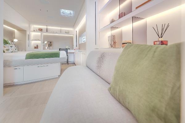 Luxurious interior of 2025 Lagoon SIXTY 5 yacht with modern design and ambient lighting.