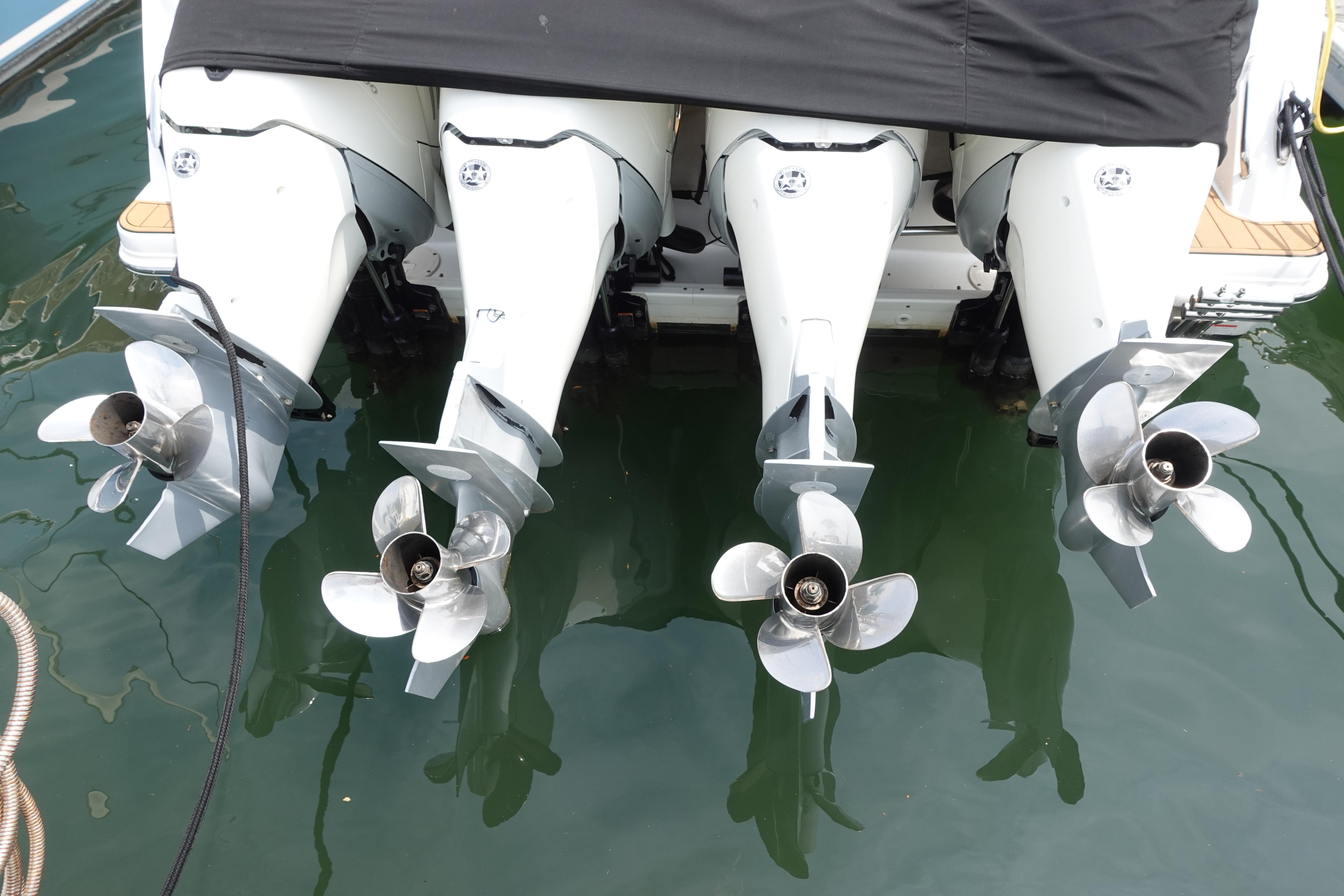 Four powerful outboard motors on a 2020 Boston Whaler 420 Outrage boat.